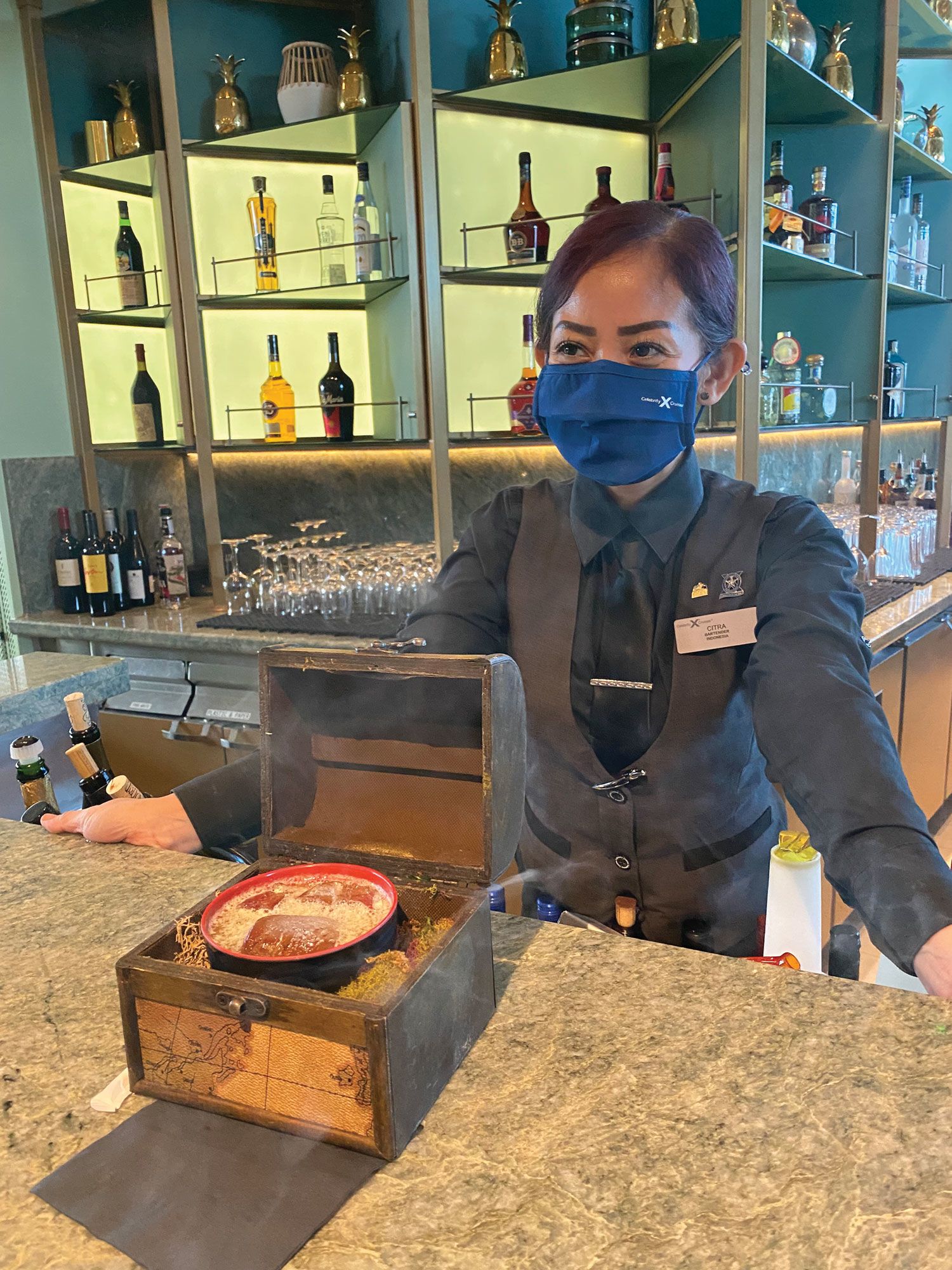 Eden serves an array of cocktails in creative ways, like the Veldt, which comes in a box with smoking dry ice. (TW photo by Johanna Jainchill)