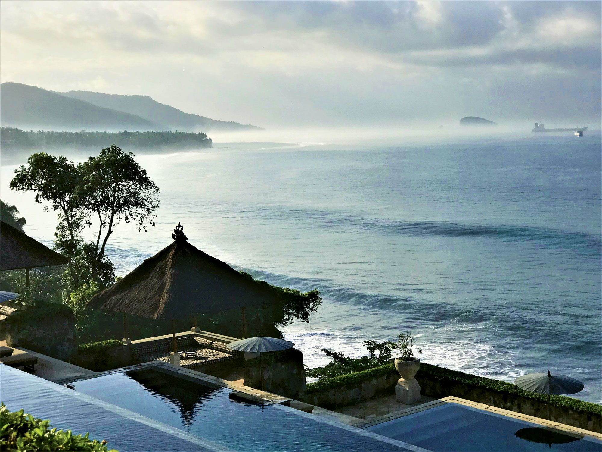 Three levels of infinity pools rise above a beach on the Lombok Strait at the Amankila. (TW photo by Arnie Weissmann)