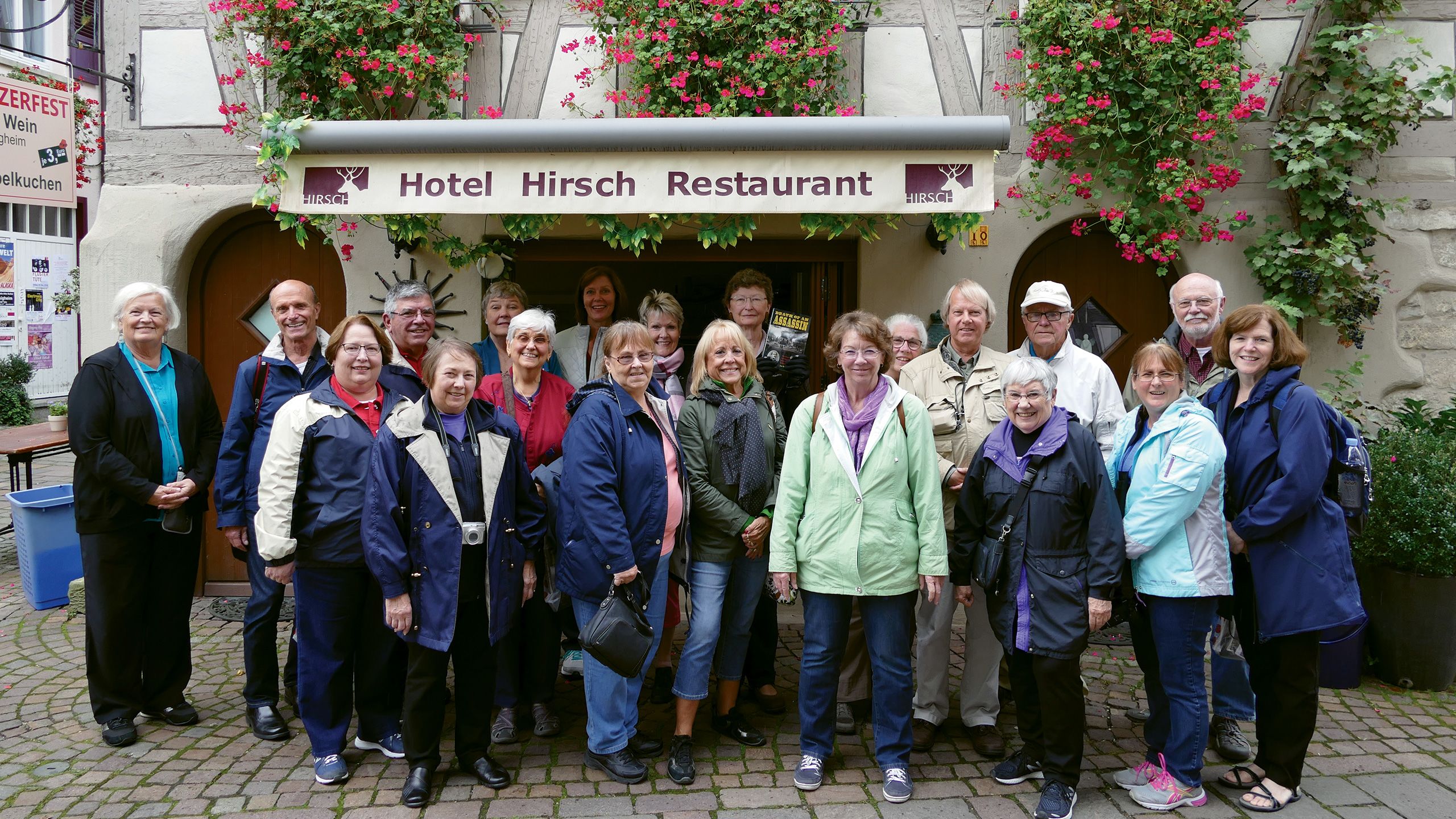Kathy Wurth of Family Tree Tours, center in light green, leading a heritage travel group in Germany last year. Wurth was inspired to launch Family Tree Tours after going on a heritage tour with her mother in the 1970s.