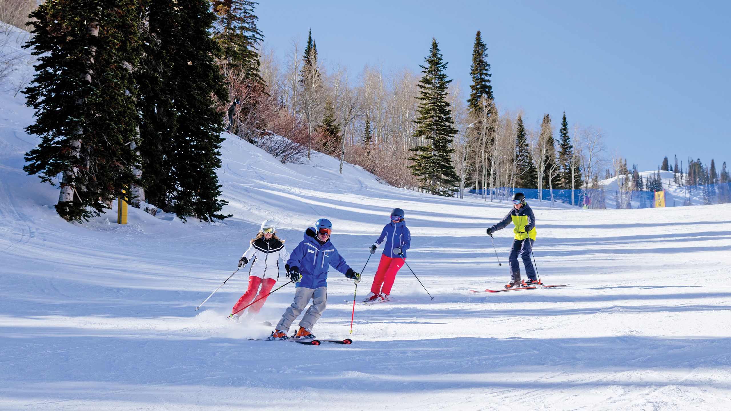 Learn and Earn beginner skiers enjoy a lesson on the Bear Hollow slope at Snowbasin Resort.