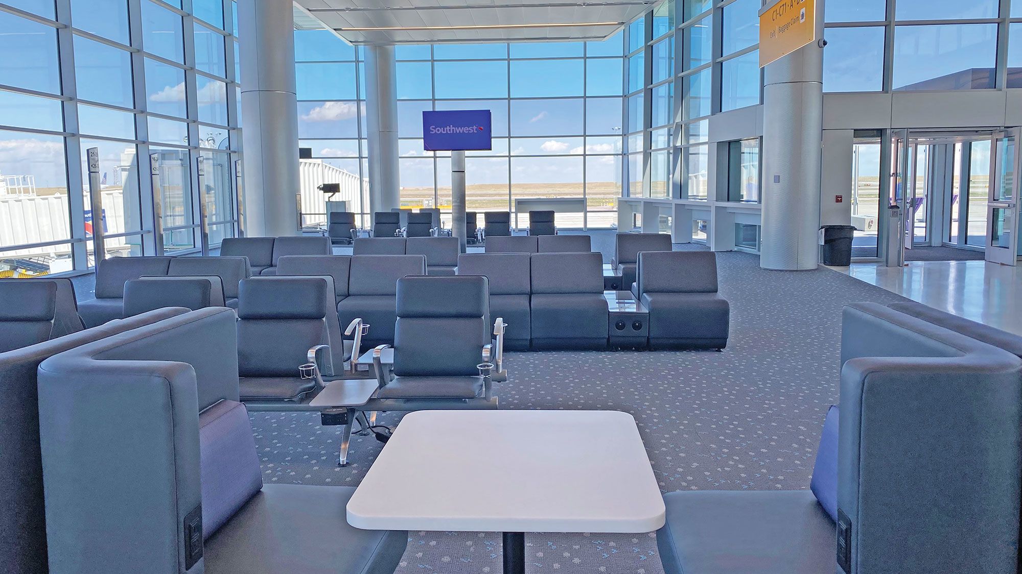 Customers in Southwest’s 16-gate expansion area at Denver Airport will enjoy a variety of comfortable seating options. (TW photo by Robert Silk)