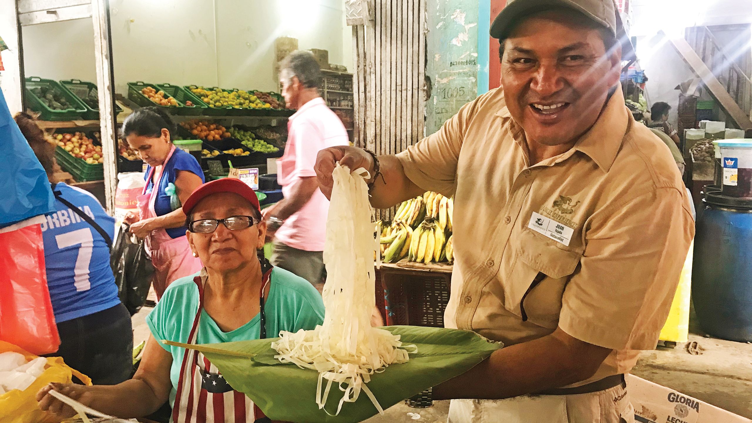 Jungle Experiences naturalist Juan Tejeda shows off some of the Amazon’s bounty sold at the market.
