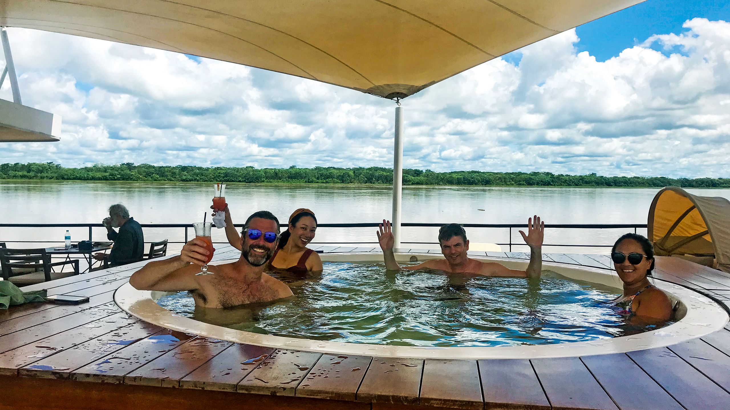 Passengers enjoy an afternoon hot tub as the Zafiro glides past jungles teeming with wildlife. 
