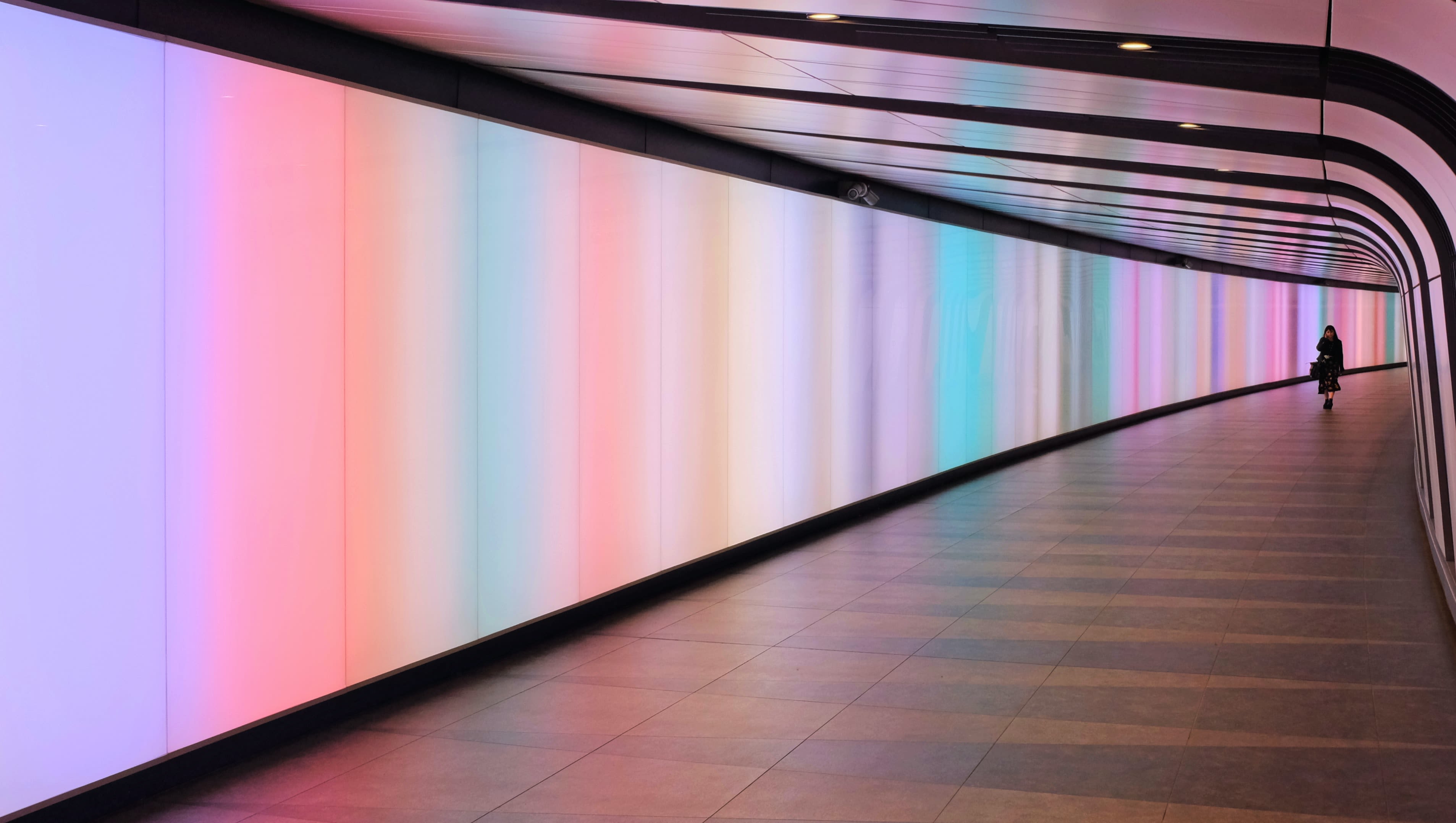 woman walking in hallway