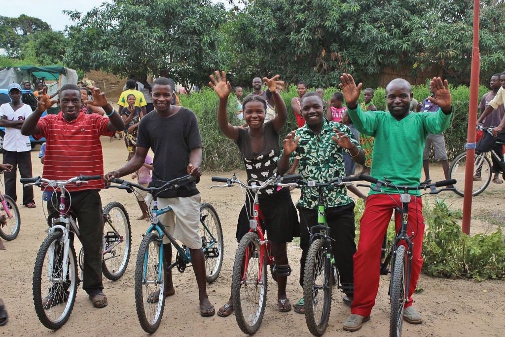 Residents of Nakatindi Village in Zambia, where Abercrombie & Kent Philanthropy helped a group of women establish a bike shop with donated bikes.
