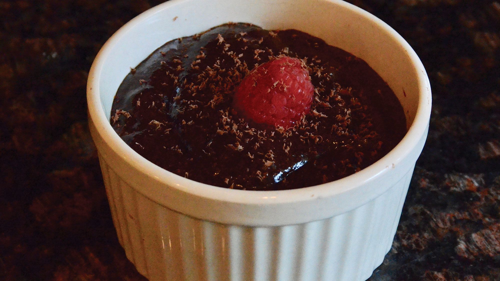 Oceania Cruises chef Renald Macouin walked reporter Jamie Biesiada through making chocolate mousse. (TW photo by Jamie Biesiada)