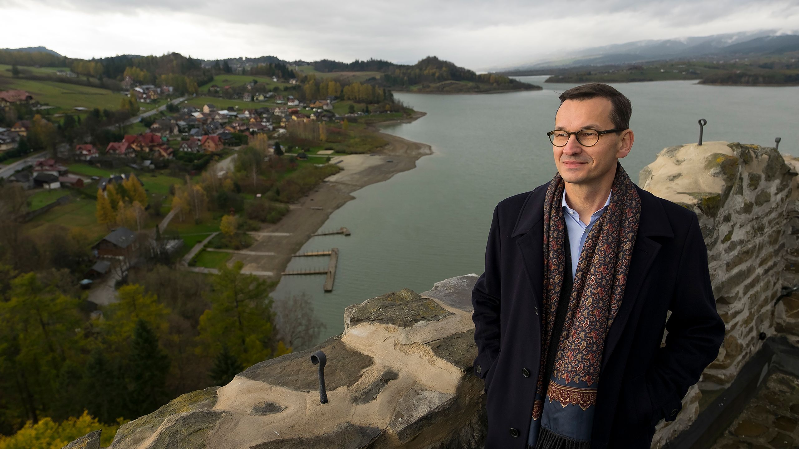 Poland’s prime minister, Mateusz Morawiecki, atop Niedzica Castle in southern Poland, waiting for a helicopter with a mounted camera to arrive and shoot the opening sequence of “Poland: The Royal Tour.” Photo by Karen Ballard
