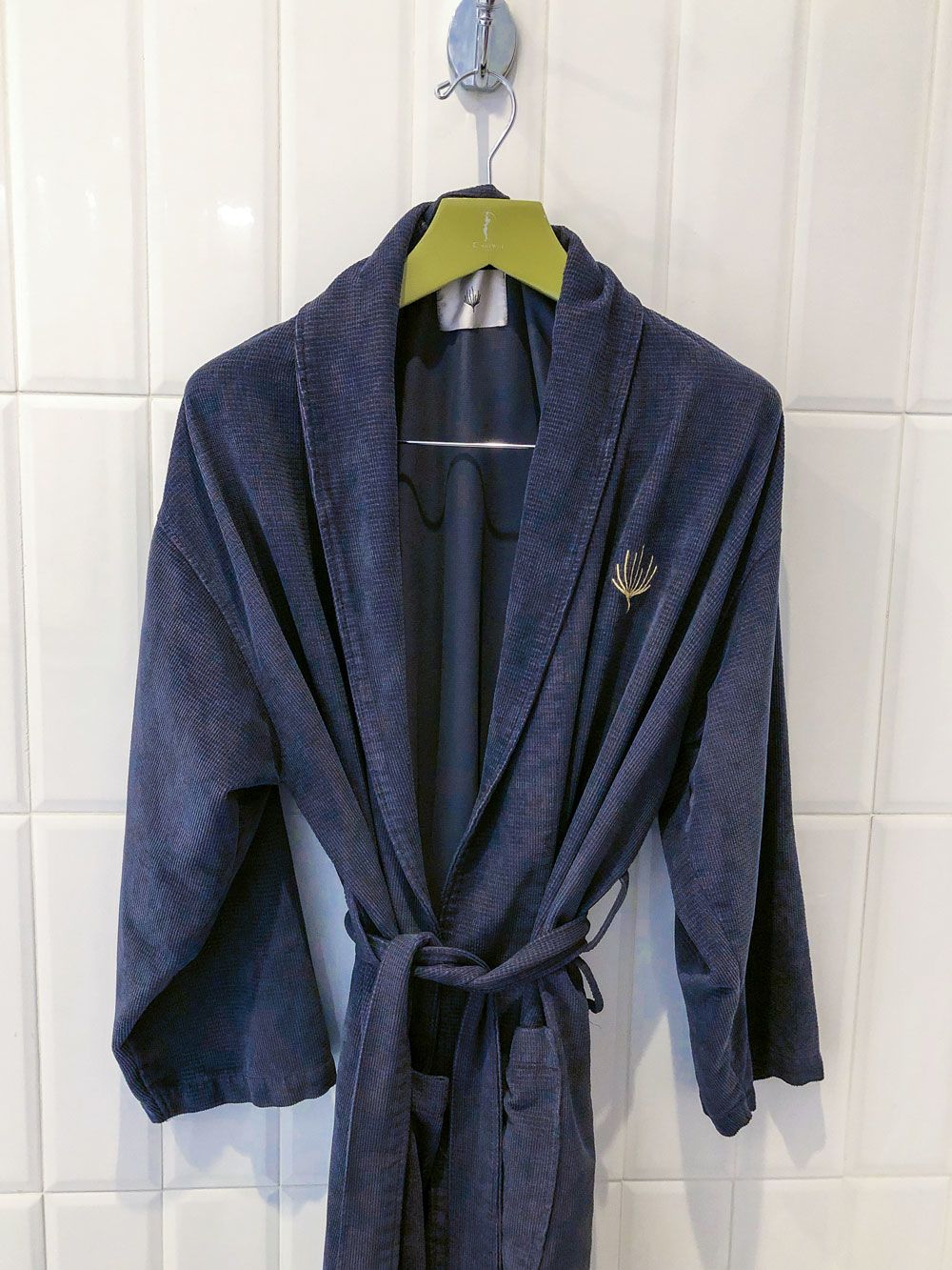 Mynd Spa & Salon, which has 26 U.S. locations, changed from gender-specific robe colors to navy blue robes for all. (TW Photo by Christina Jelski)