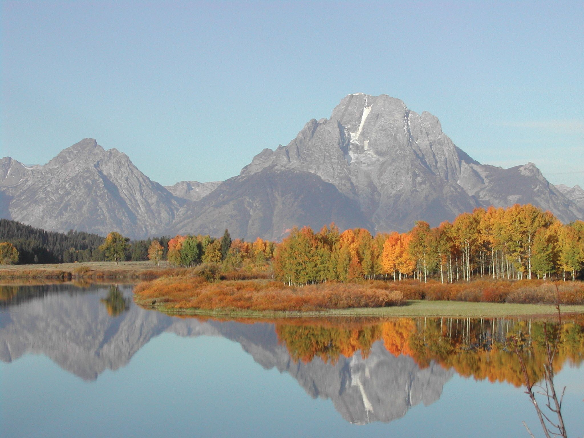 Mount Moran is reflected in the Snake River at Grand Teton National Park. National parks have been popular destinations in the pandemic era.