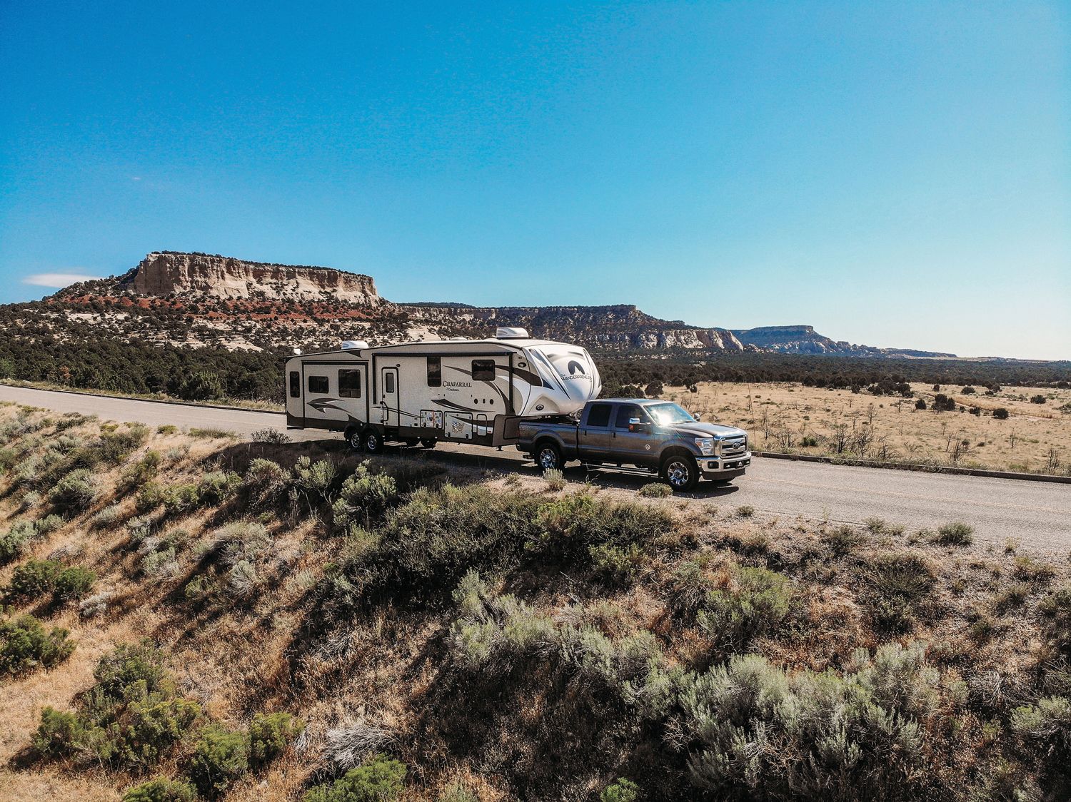 An RVshare travel trailer being towed on the open road. RVshare says bookings on its peer-to-peer rental marketplace have surged 650% since early April. (Courtesy of RVshare)