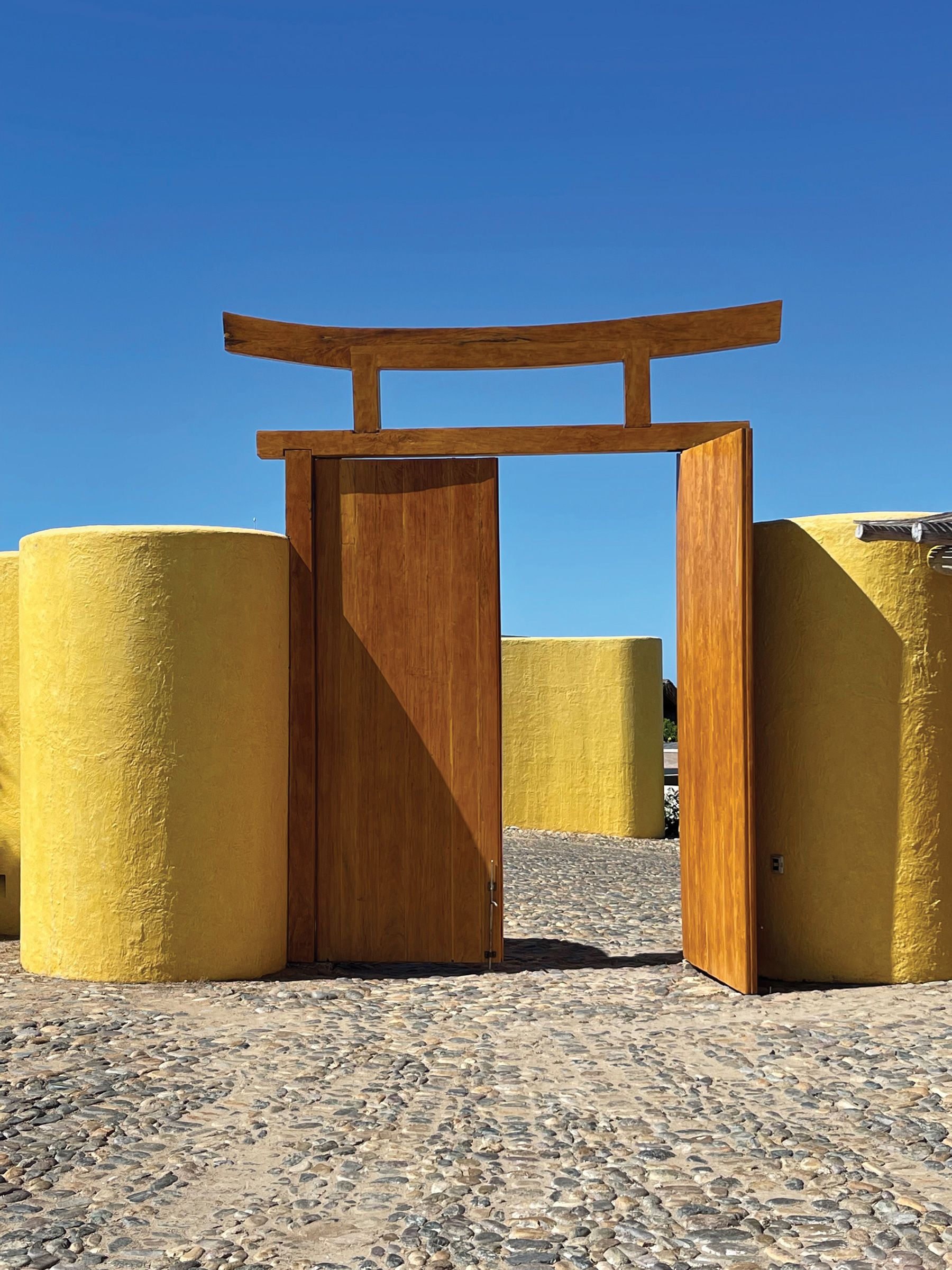 The gate to Sol de Oriente is inspired by a Shinto  “torii.”