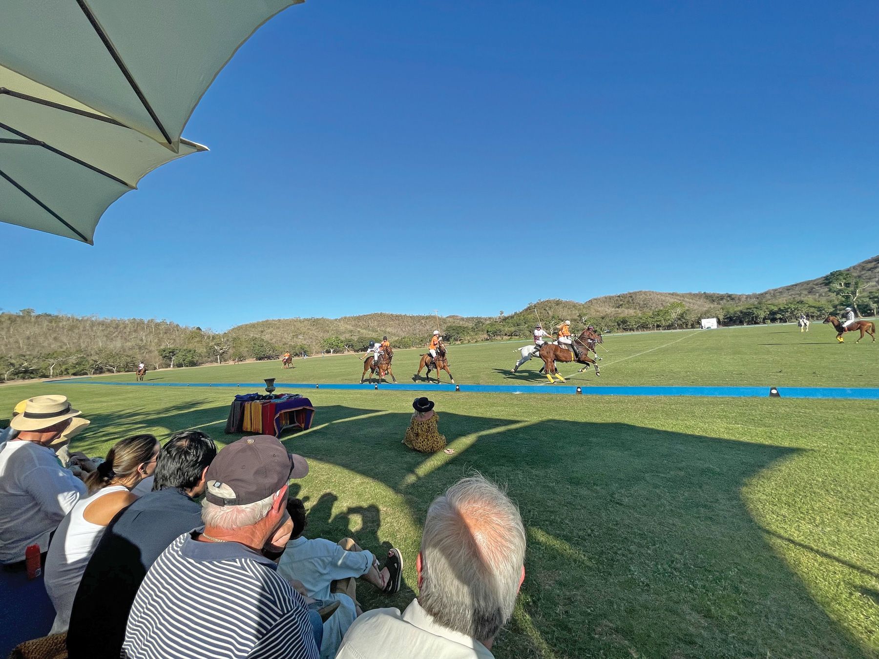 Careyes residents and guests watch a polo match on the resort’s polo field, the largest in Mexico.