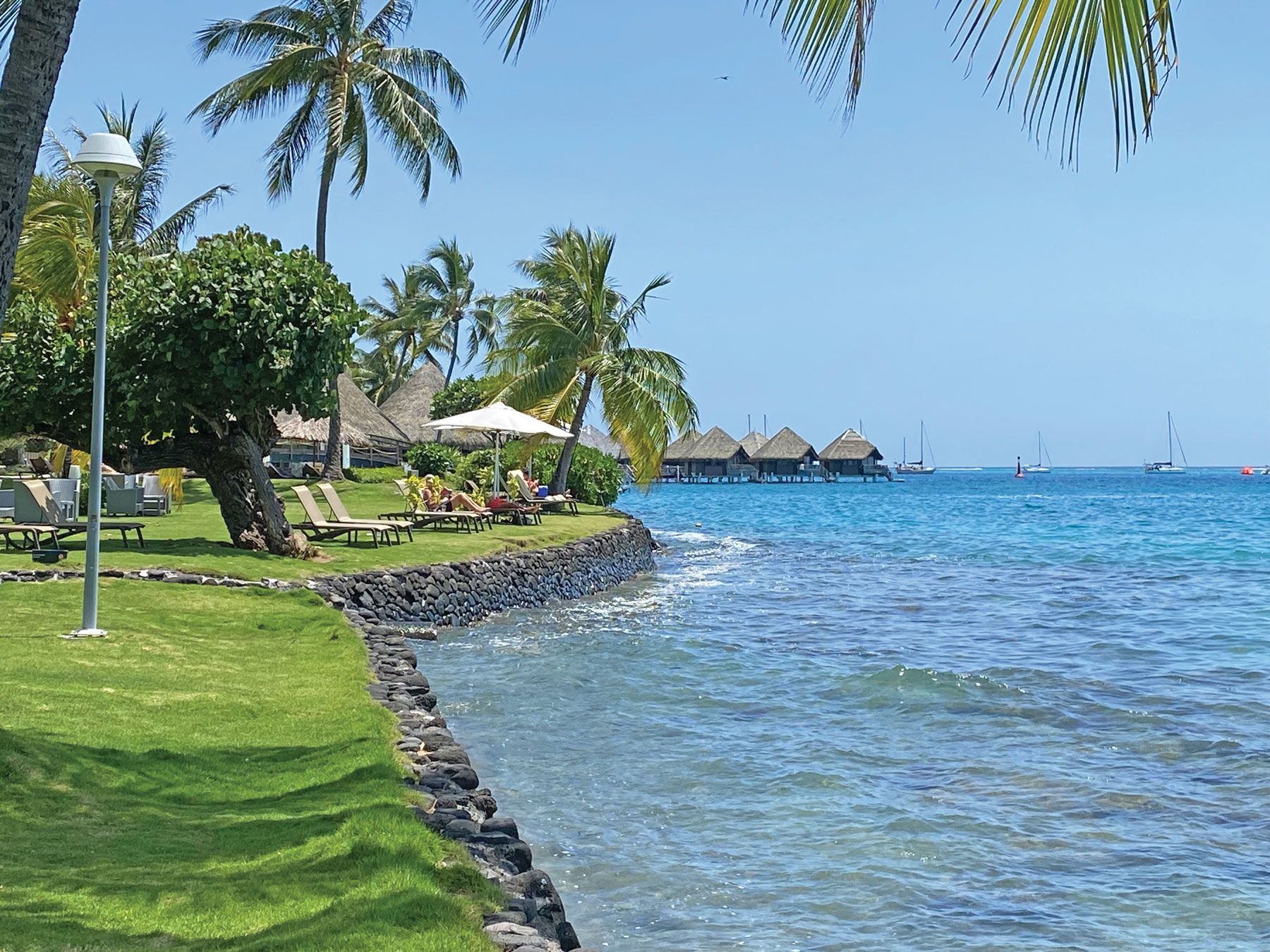 The InterContinental Tahiti Resort and Spa near Papeete features overwater bungalows. There’s no beach, but guests can watch ships sail by the waterfront. (TW photo by Andrea Zelinski)