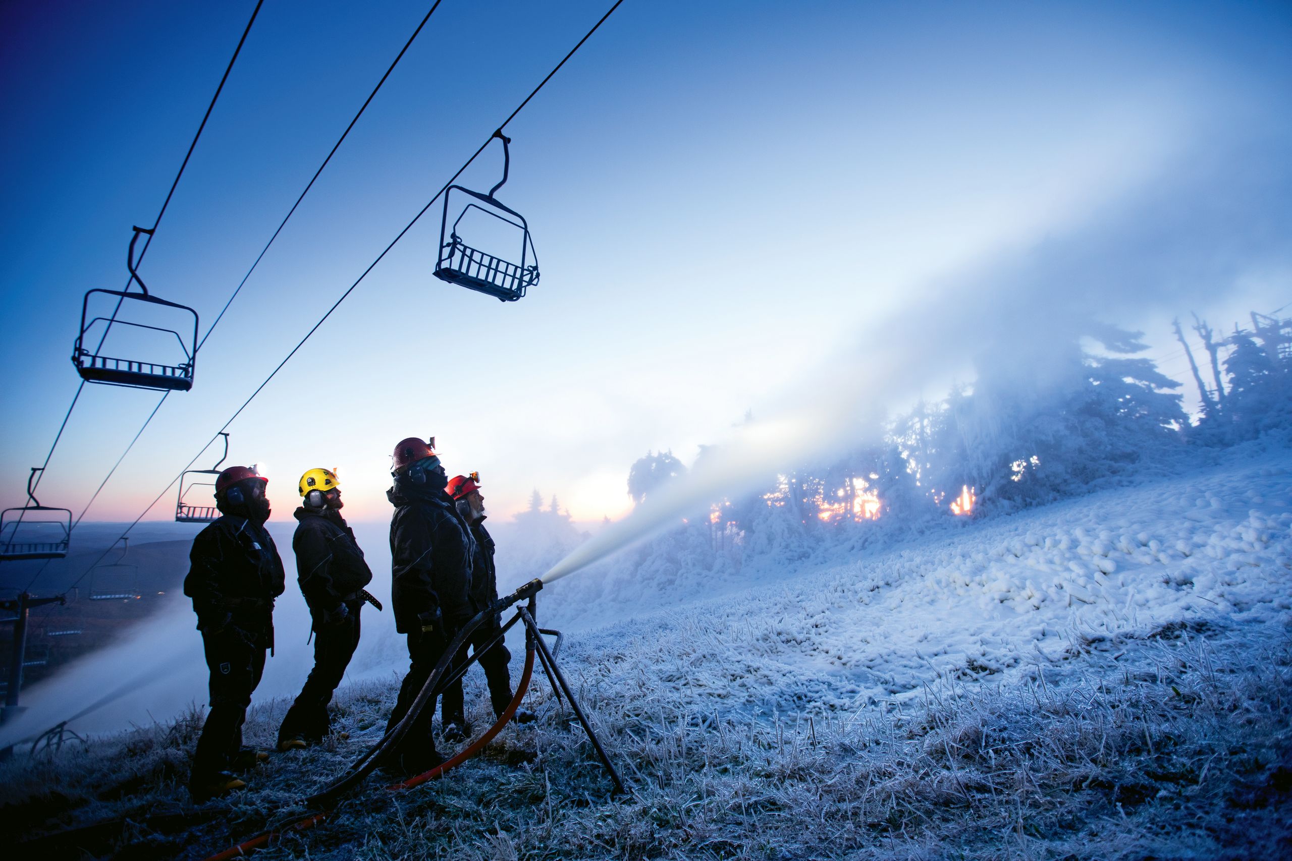 Workers at Vermont’s Killington, where the snowmaking systems include 88 miles of piping.