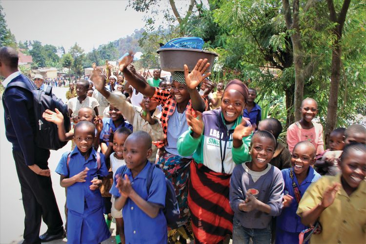  Residents near Lake Kivu react to an unannounced visit by Kagame during the shooting of “The Royal Tour.”