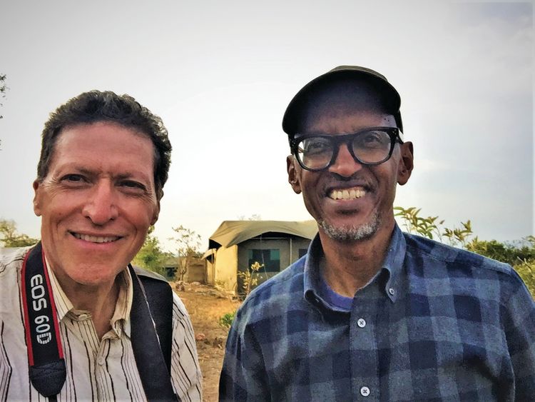 Travel Weekly editor in chief Arnie Weissmann, left, and Rwandan president Paul Kagame in Akagera National Park.
