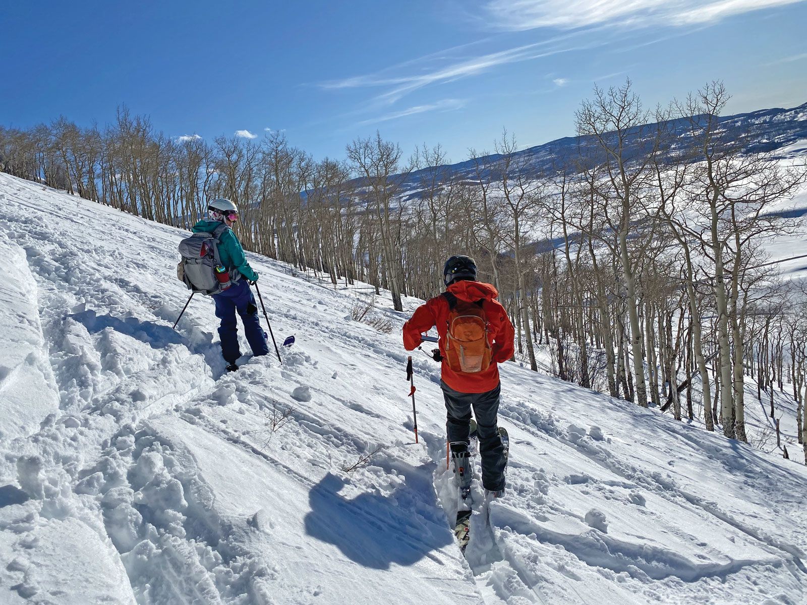 Skiers with Bluebird Backcountry prepare to drop into a run in Colorado. (TW Photo by Robert Silk)