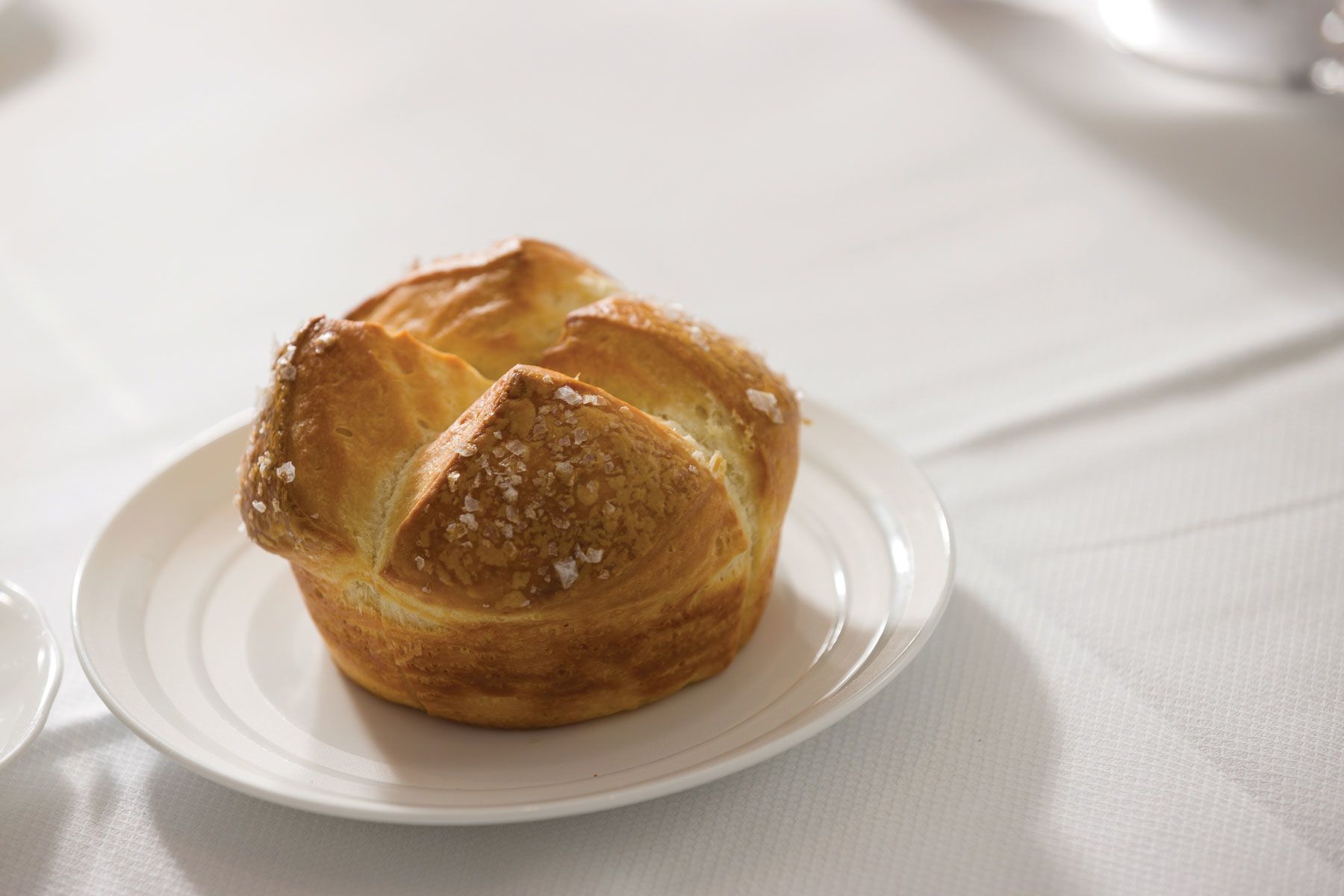 Pain au lait was among the dishes served during the Consumer Travel Editors Roundtable.