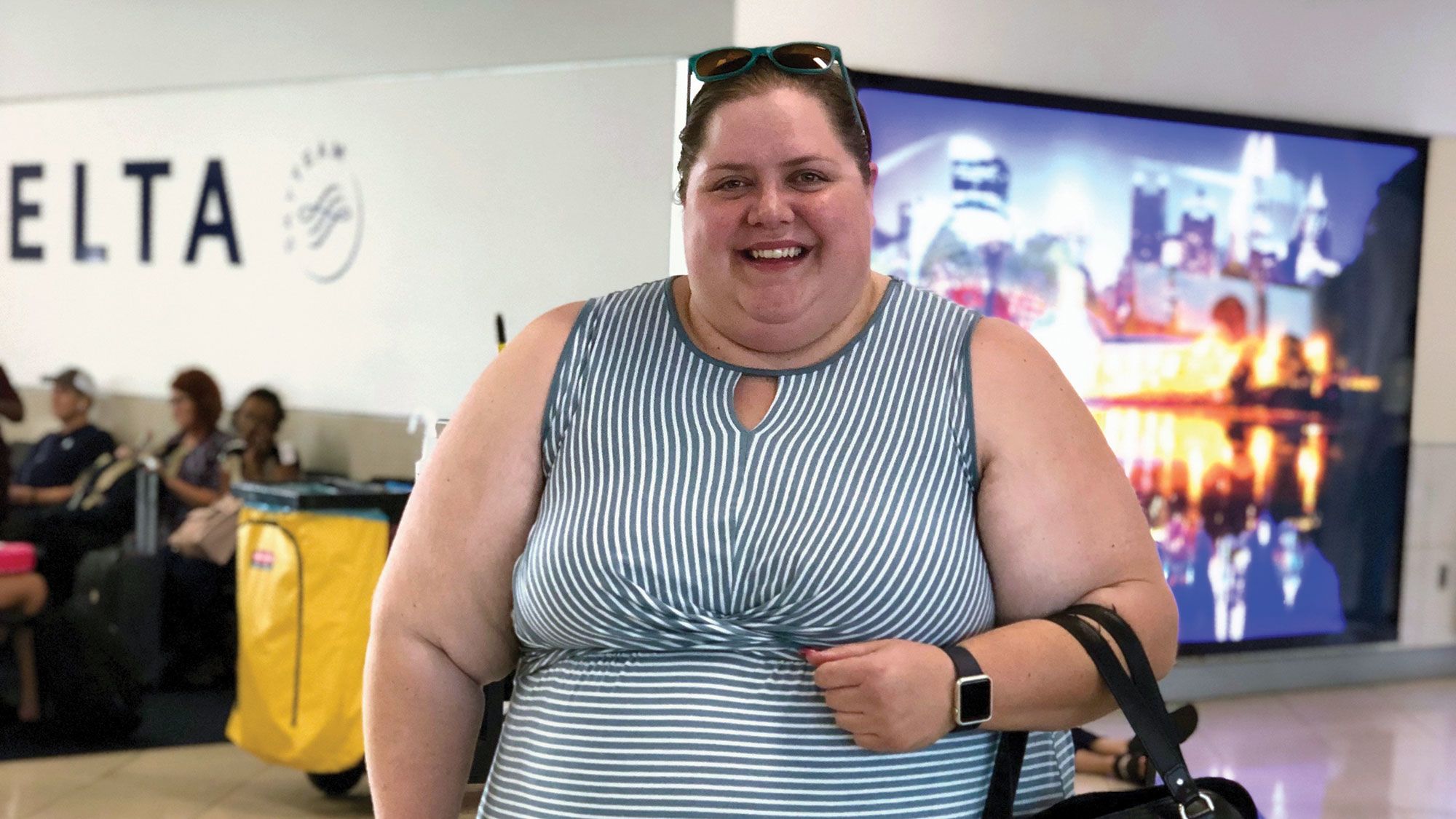 Rebecca Alexander, founder of the plus-size travel review site AllGo, at the airport in Atlanta.