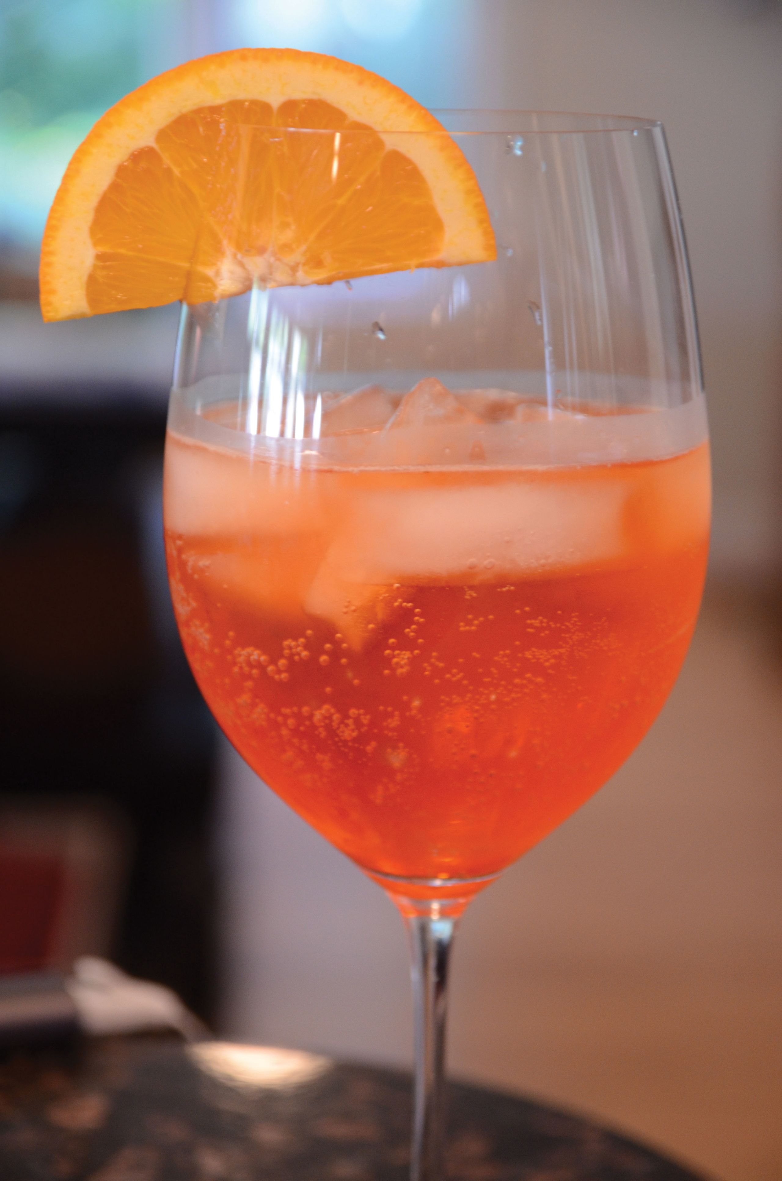 The perfect Aperol spritz, concocted using the PASS method: prosecco, Aperol, soda and a slice (of orange). (TW photo by Jamie Biesiada)
