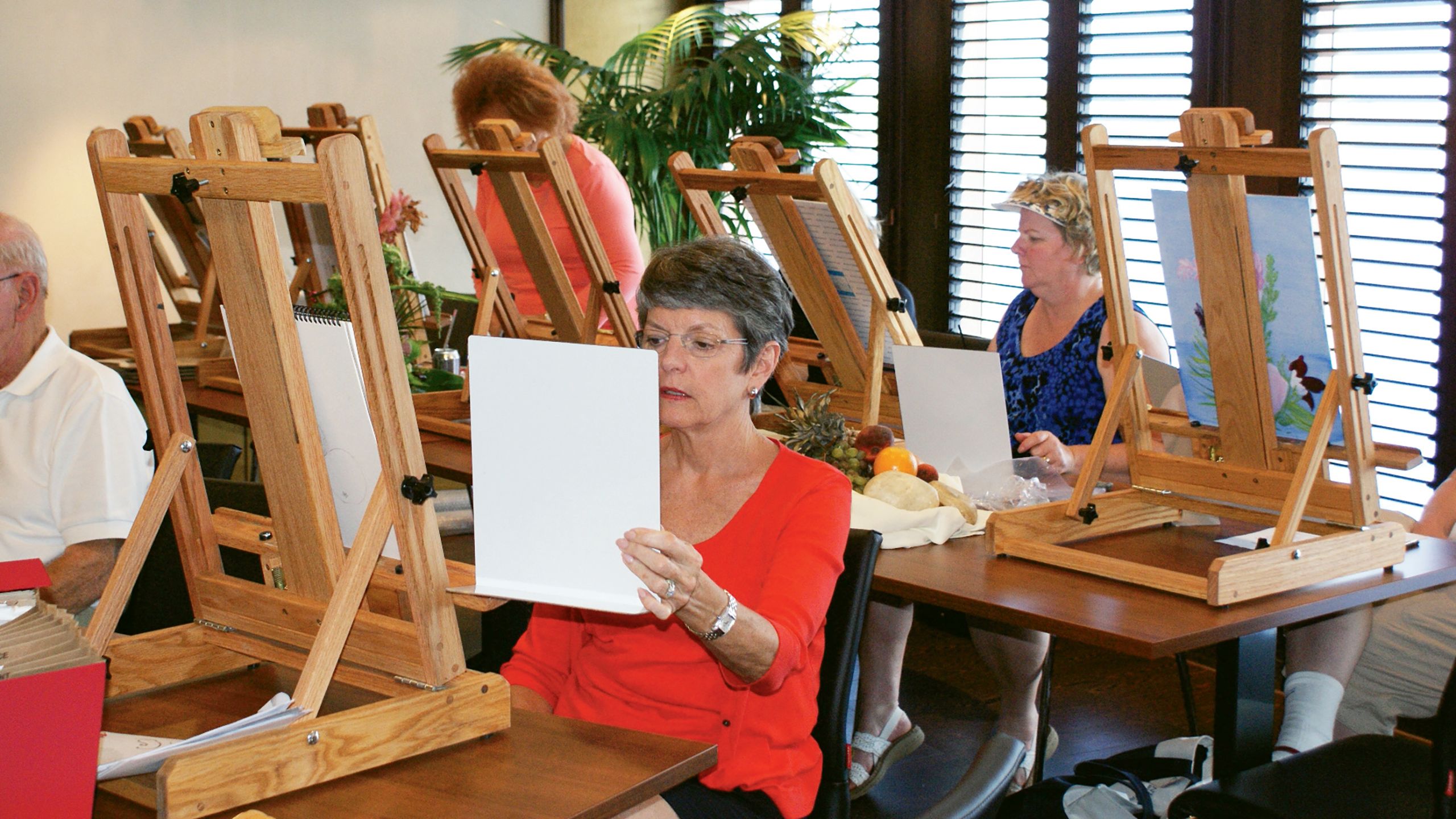 The Artist Lofts on  Oceania Cruises provide a workshop for passengers and instruction from an artist-in-residence.