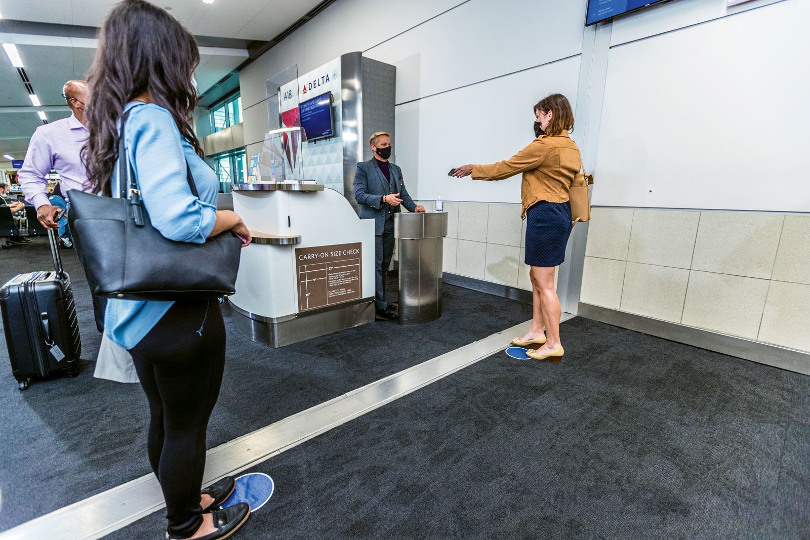 Delta uses social distancing floor markings at boarding gates as part of its Delta CareStandard program.