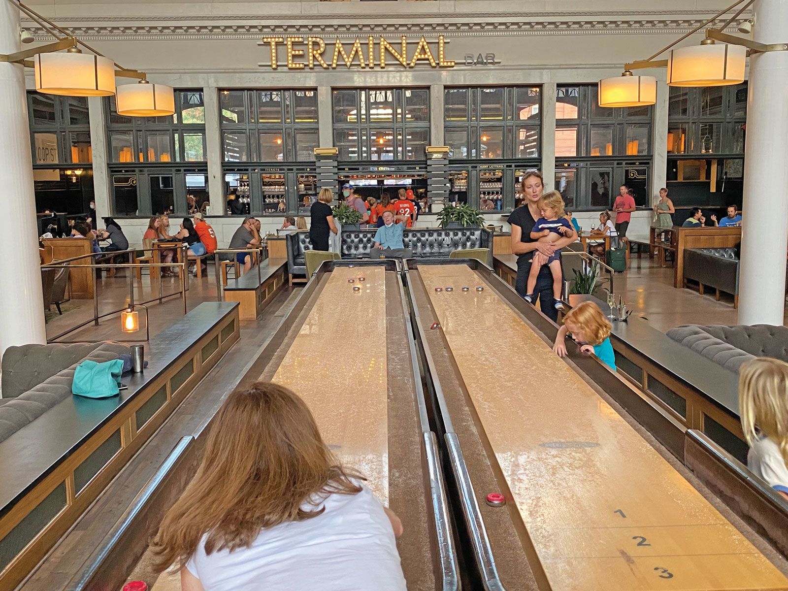 Passengers waiting for a train can pass the time playing shuffleboard in the station. (TW photo by Robert Silk)