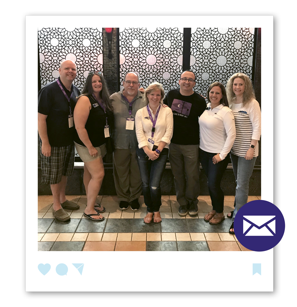Whiting, center, at a live Disney Dish event with the podcast’s hosts, Jim Hill, third from left, and Len Testa, third from right, as well as Storybook travel advisors, from left, Cameron Edgar, Missy Bonnice, Heather Keller and Heather Jarrett.