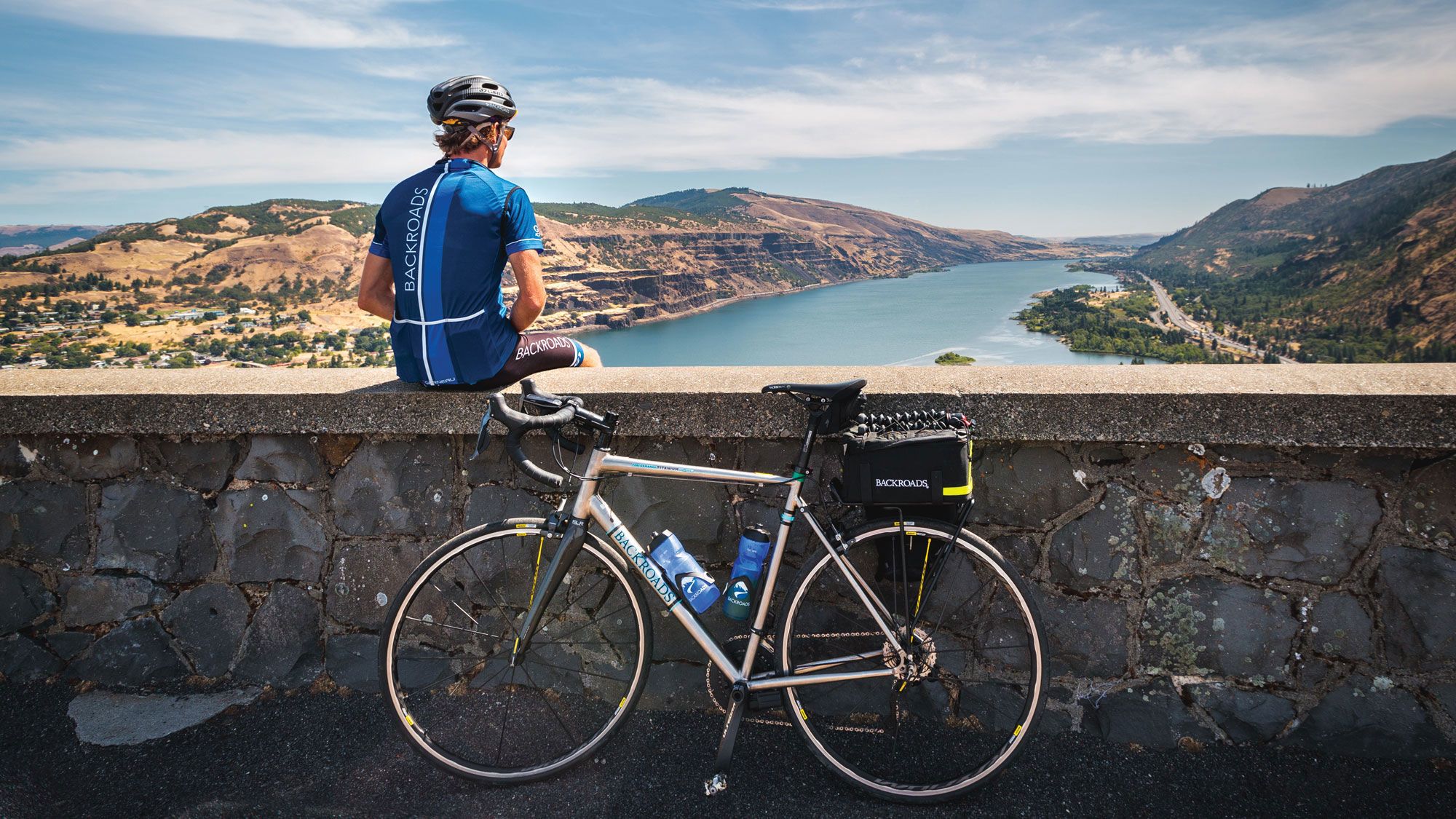 A cyclist pauses to take in the view on Backroads’ Columbia River Gorge Bike Tour. (Photo by Andrew Opila/Backroads)