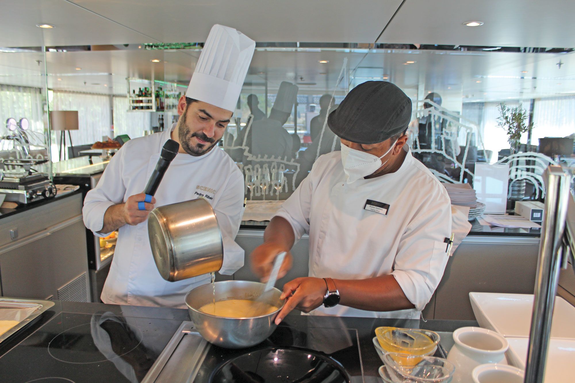 Executive chef Pedro Ribeiro and pastry chef Rafael Gomes during a pastry cooking demonstration on the Scenic Azure. (Photo by Richard Varr)
