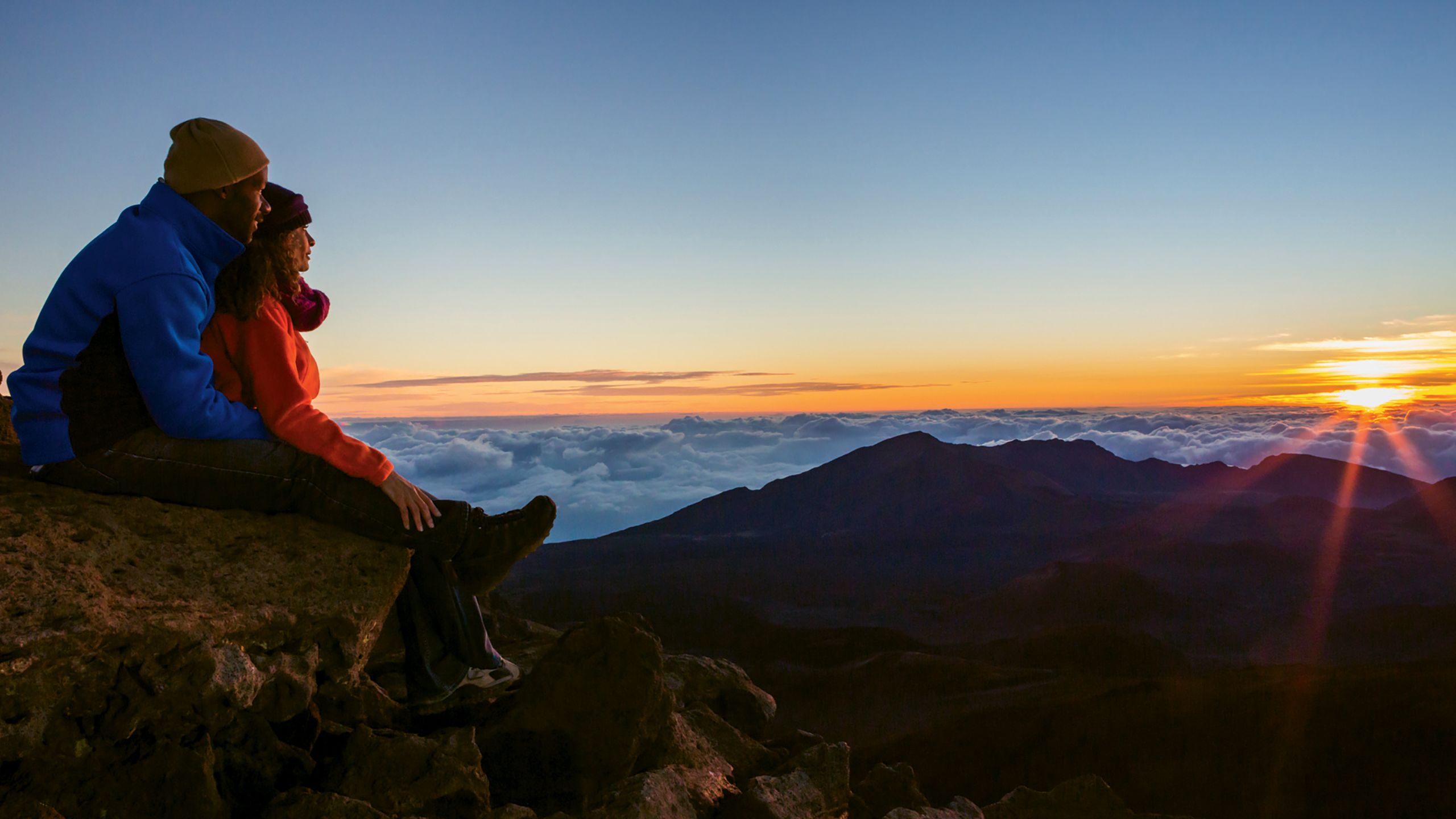 In 2017 a reservation system was instituted to control sunrise viewing crowds at Haleakala National Park on Maui. Photo by Tor Johnson/HTA
