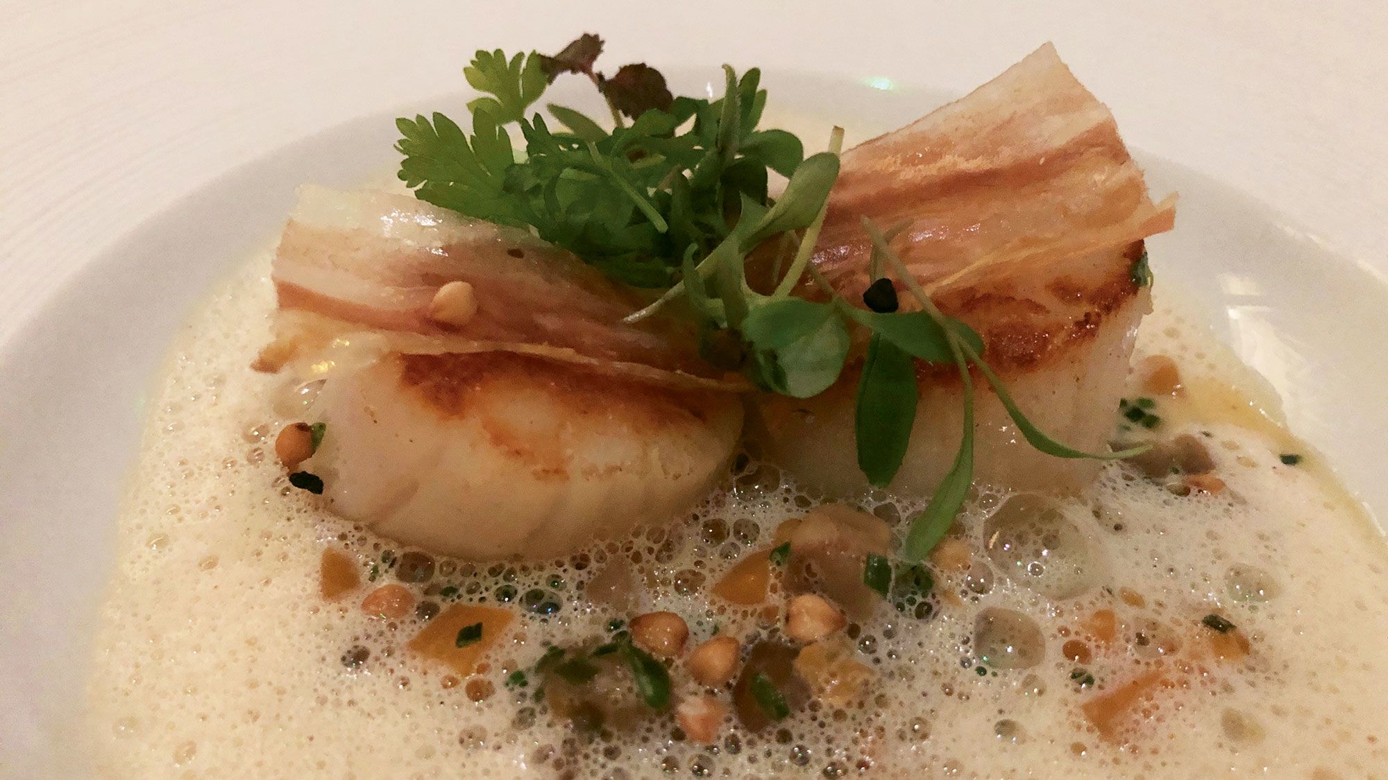 Scallops with pumpkin risotto and bacon at the Grand Cafe Fauchon on the ground floor of the Fauchon L’Hotel. (TW photo by Johanna Jainchill)