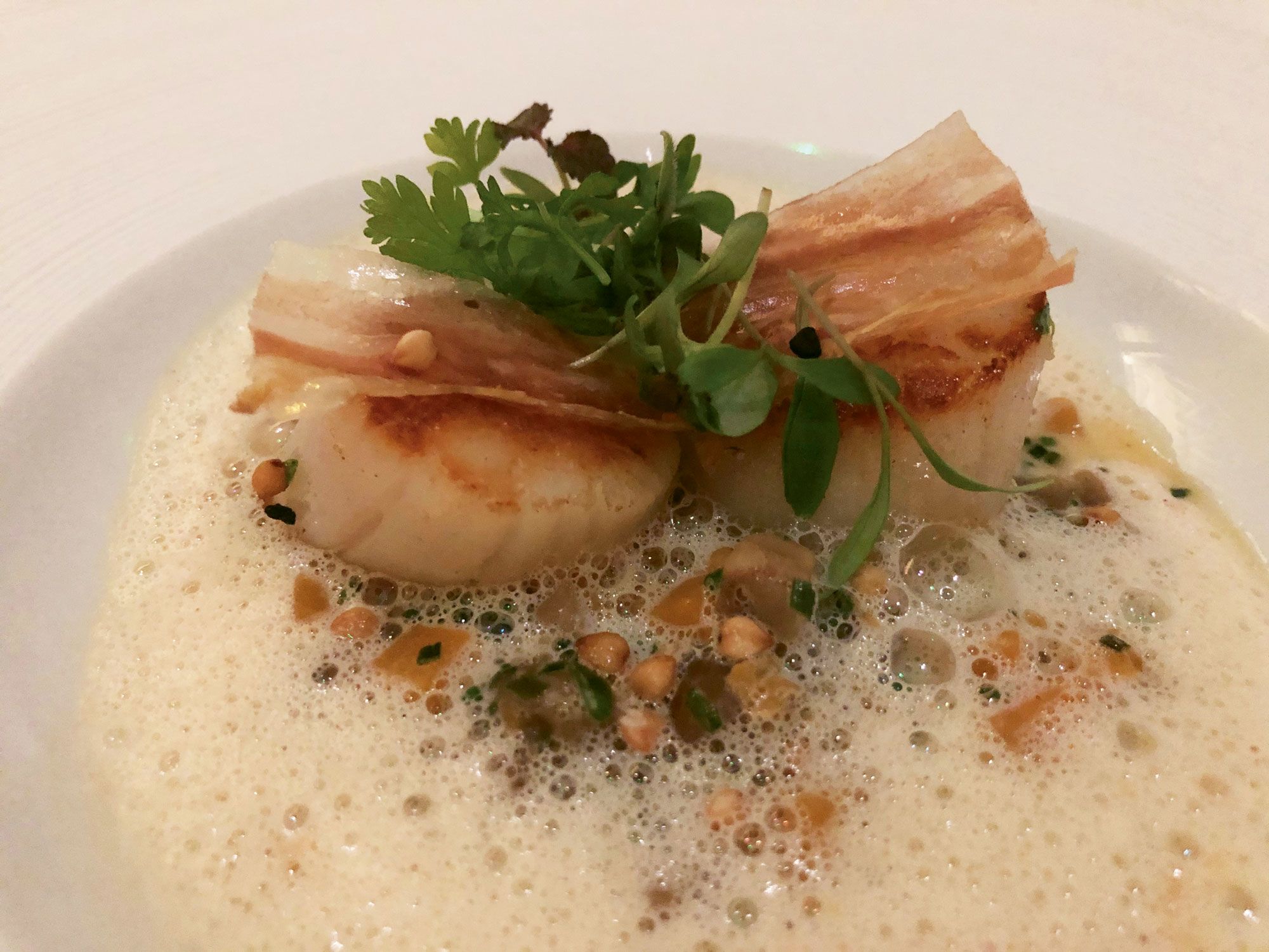 Scallops with pumpkin risotto and bacon at the Grand Cafe Fauchon on the ground floor of the Fauchon L’Hotel. (TW photo by Johanna Jainchill)