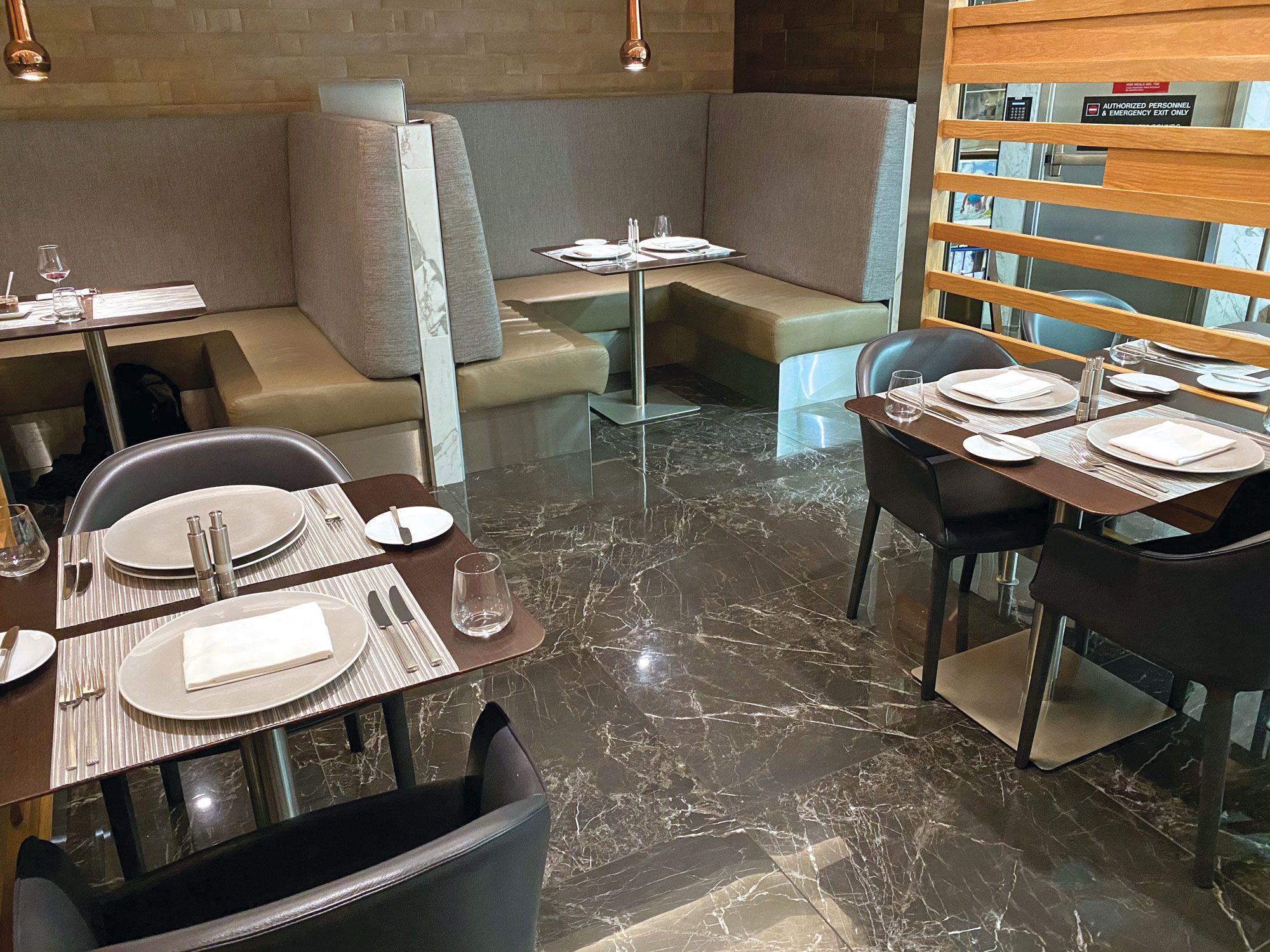 The Flagship First Dining area is an intimate space within American Airlines’ larger Flagship First lounge at Miami Airport. (TW photo by Robert Silk)