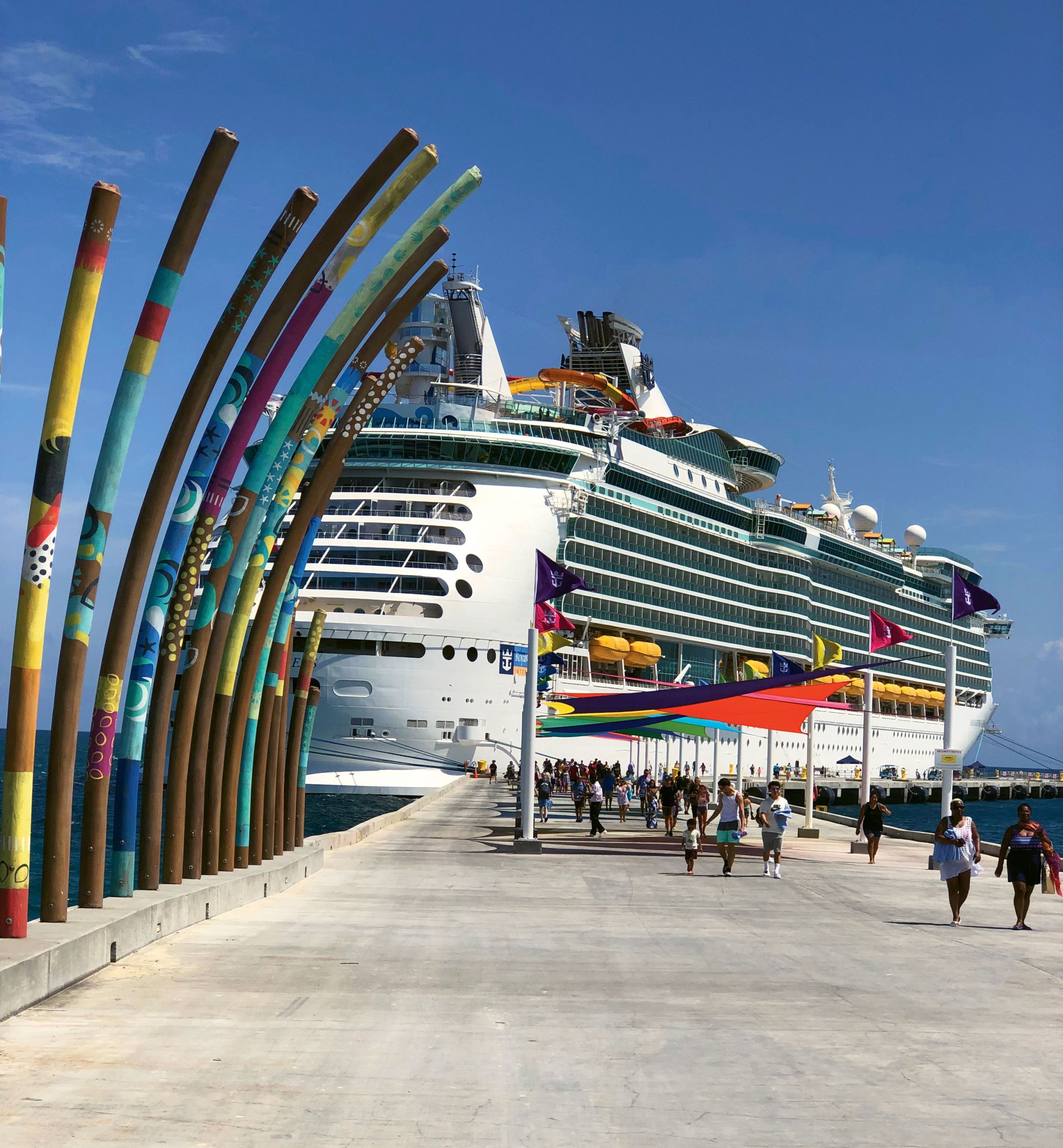 The Navigator of the Seas docked at CocoCay. Newer private island developments like CocoCay have piers so they can accommodate larger ships. (TW photo by Tom Stieghorst)