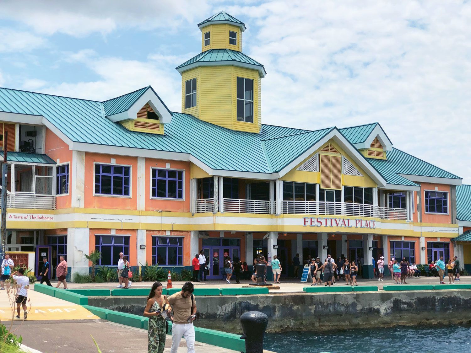 Passengers arriving by cruise ship in Nassau pass through Festival Place to embark on excursions or visit downtown. A $250 million redevelopment of the cruise harbor area is in the works. (TW photo by Tom Stieghorst)