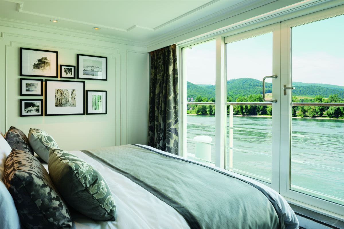 Watch the river roll by from your Crystal Mozart bedroom suite