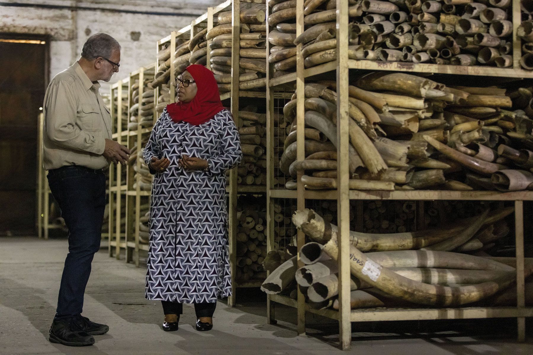 Hassan speaks to Peter Greenberg about the country’s progress against poaching in a secret warehouse that holds more than 49,000 elephant tusks confiscated from poachers.&nbsp;(Photo by Karen Ballard)