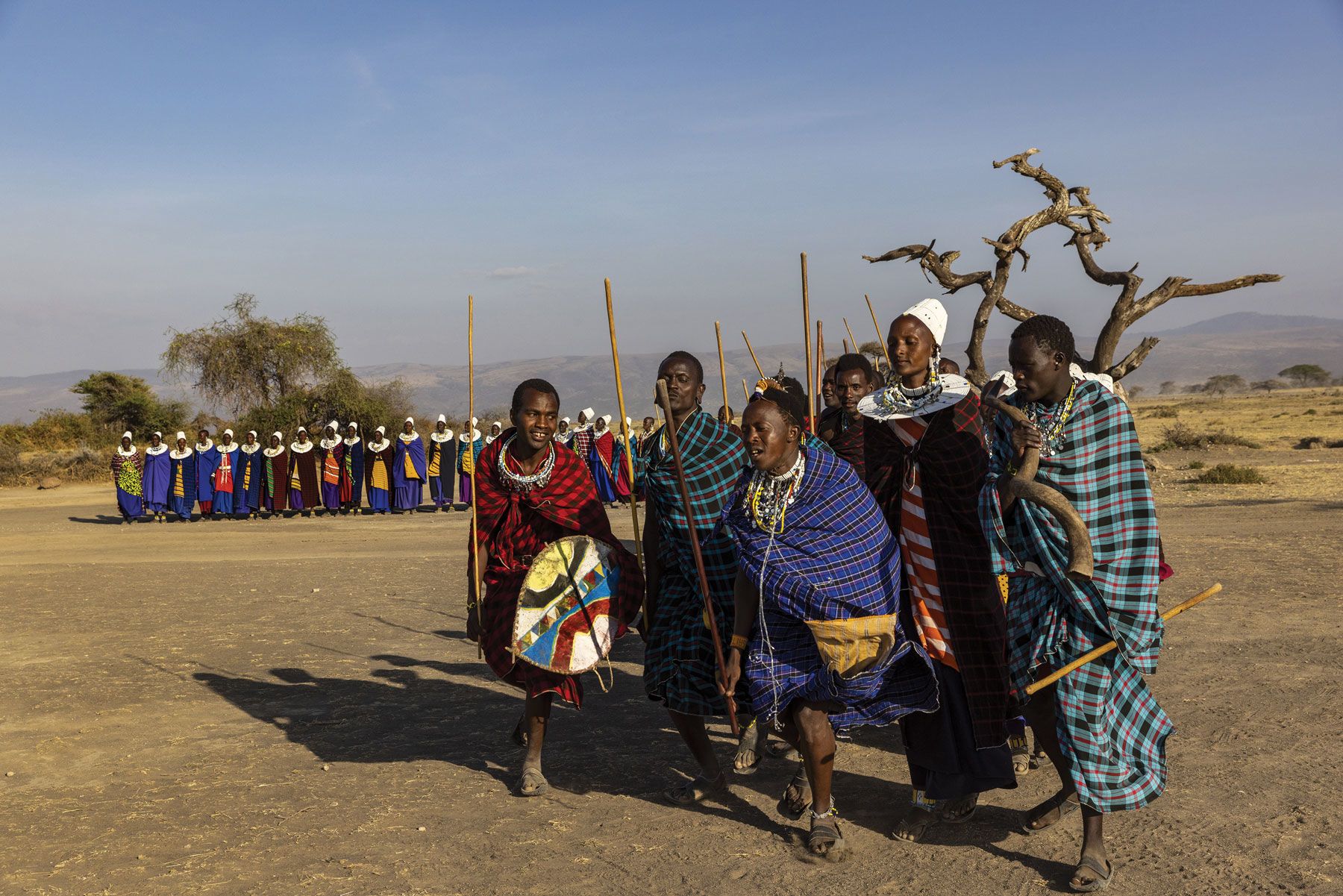 Members of the Masai tribe in Serengeti National Park perform for the president. (Photo by Karen Ballard)