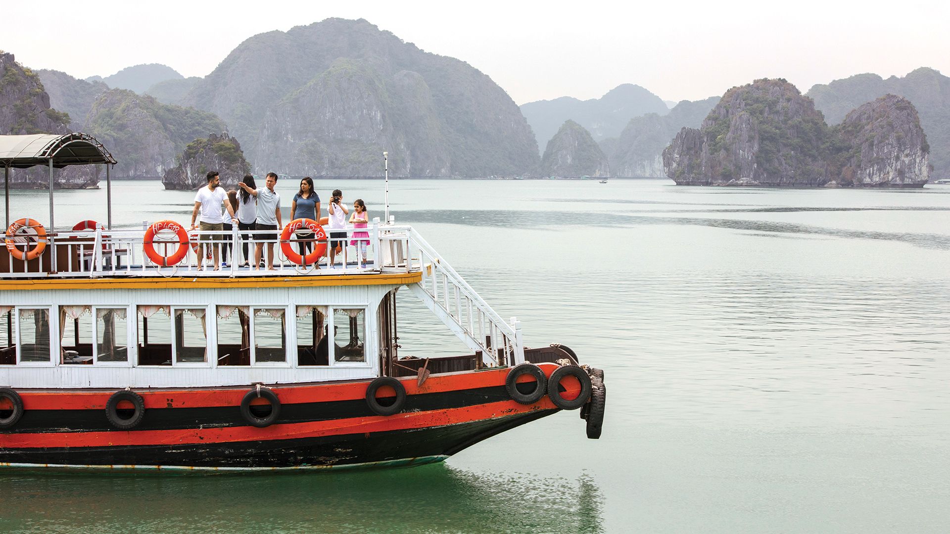 A boat cruise is part of the itinerary for a G Adventures National Geographic Family Journeys Vietnam trip.