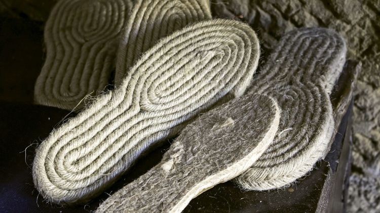 While in port in Bilbao, left, Azamara Club Cruises takes a group into the Basque countryside to visit one of the few craftsmen who still makes hemp-and-cotton espadrille sandals by hand. 
