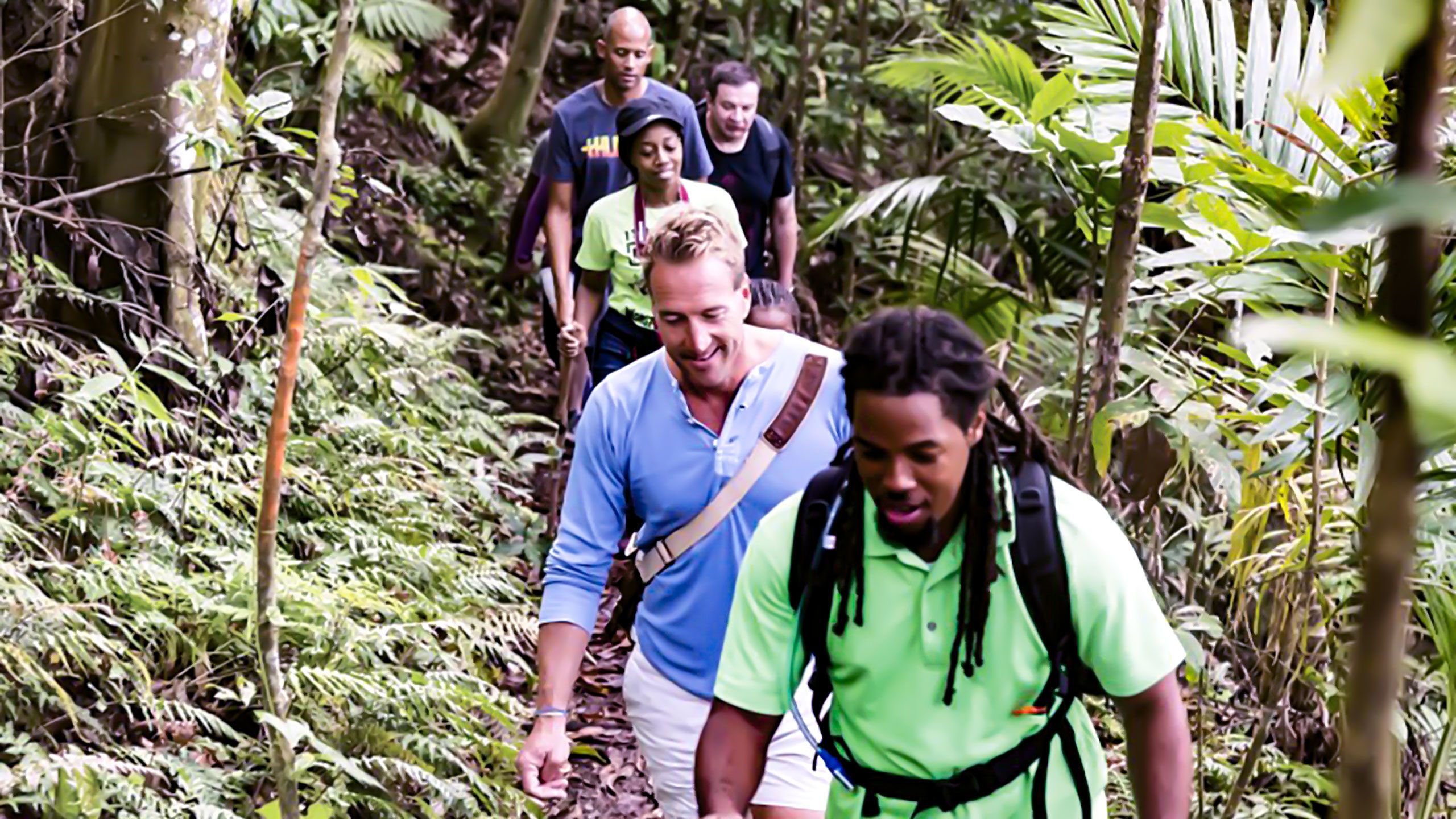 British adventurer Ben Fogle, pictured second in line here while escorting a hiking tour to the peak of a volcano, is the brand name on a newly expanded collection of shore excursions at Celebrity Cruises.