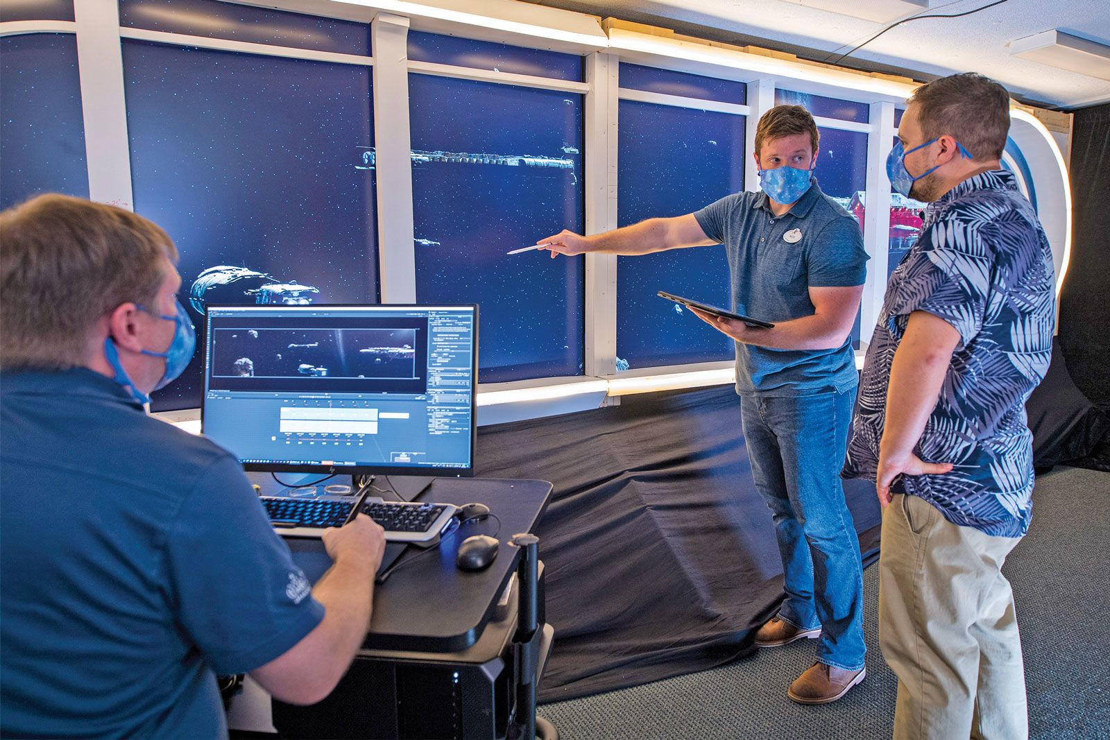 Concept designer Nick Snyder and fellow Imagineers work on the Star Wars: Hyperspace Lounge mock-up at Walt Disney Imagineering.