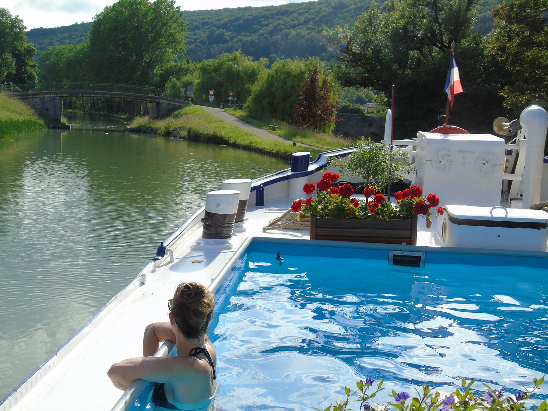 The pool on Belmond’s six-passenger, ultraluxe Fleur de Lys barge in Burgundy, France. (Courtesy of Frontiers International Travel)