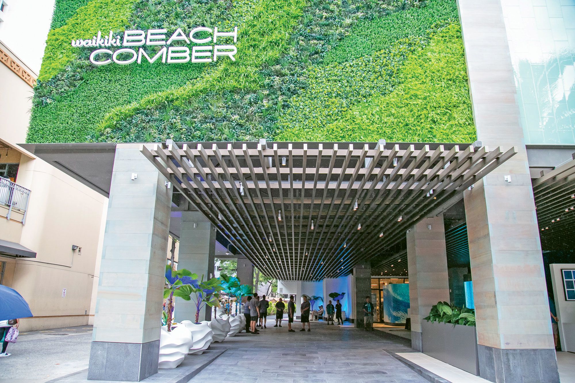 When the Waikiki Beachcomber by Outrigger was relaunched in April 2019, the company implemented a new technology package, including an app, right, that connects guests to a variety of services and information.  (Photo by Outrigger Hospitality Group)