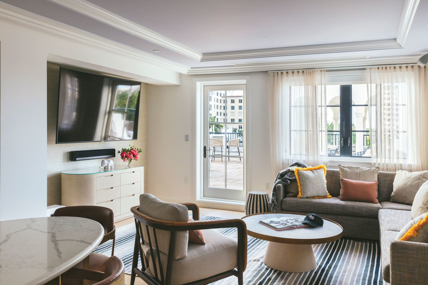 A suite living room at the White Elephant Palm Beach, where opening plans now call for additional investment in new technology and supplies needed to comply with elevated safety protocols.