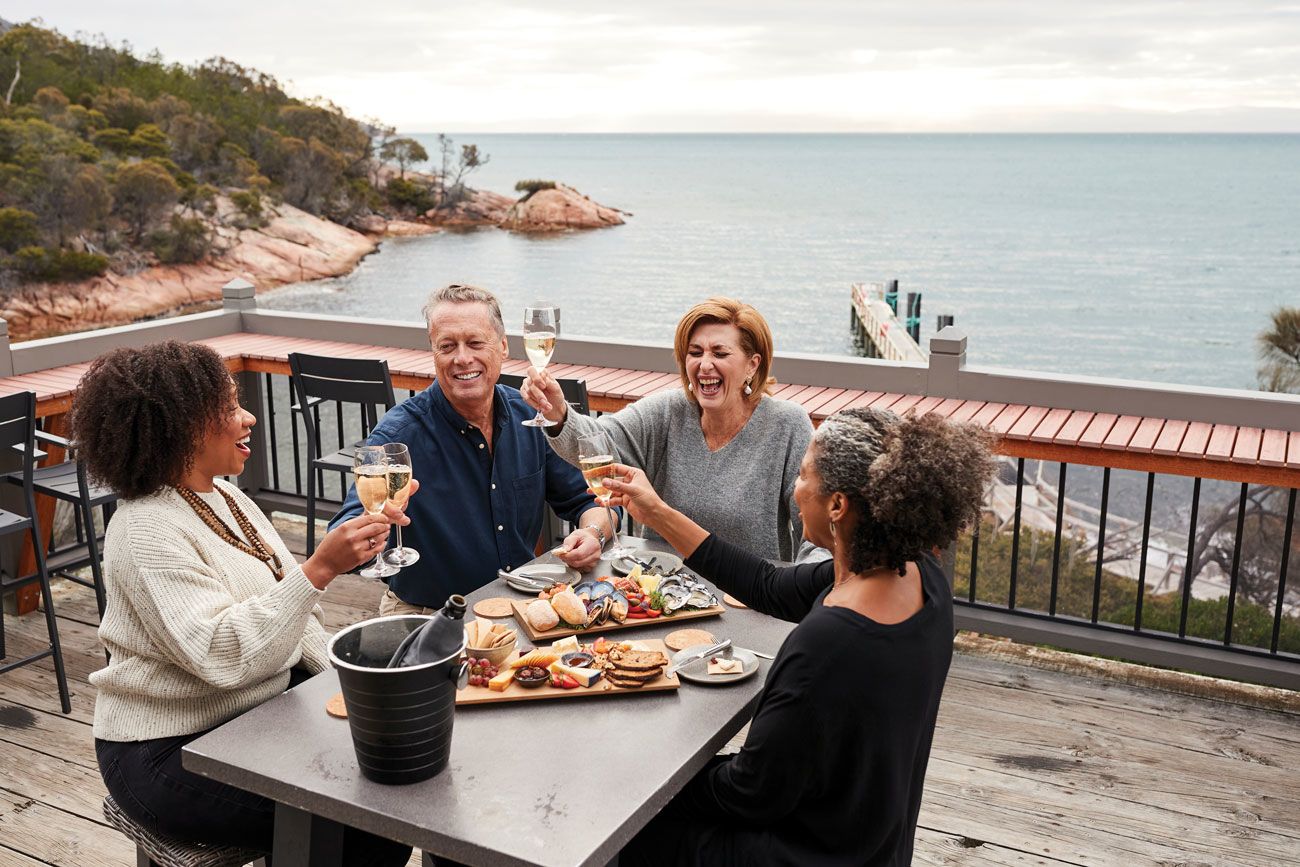 Guests on a Trafalgar tour in Tasmania’s Freycinet National Park. The company is allowing clients to lock in a 2021 trip at the current price and then pay in installments.   