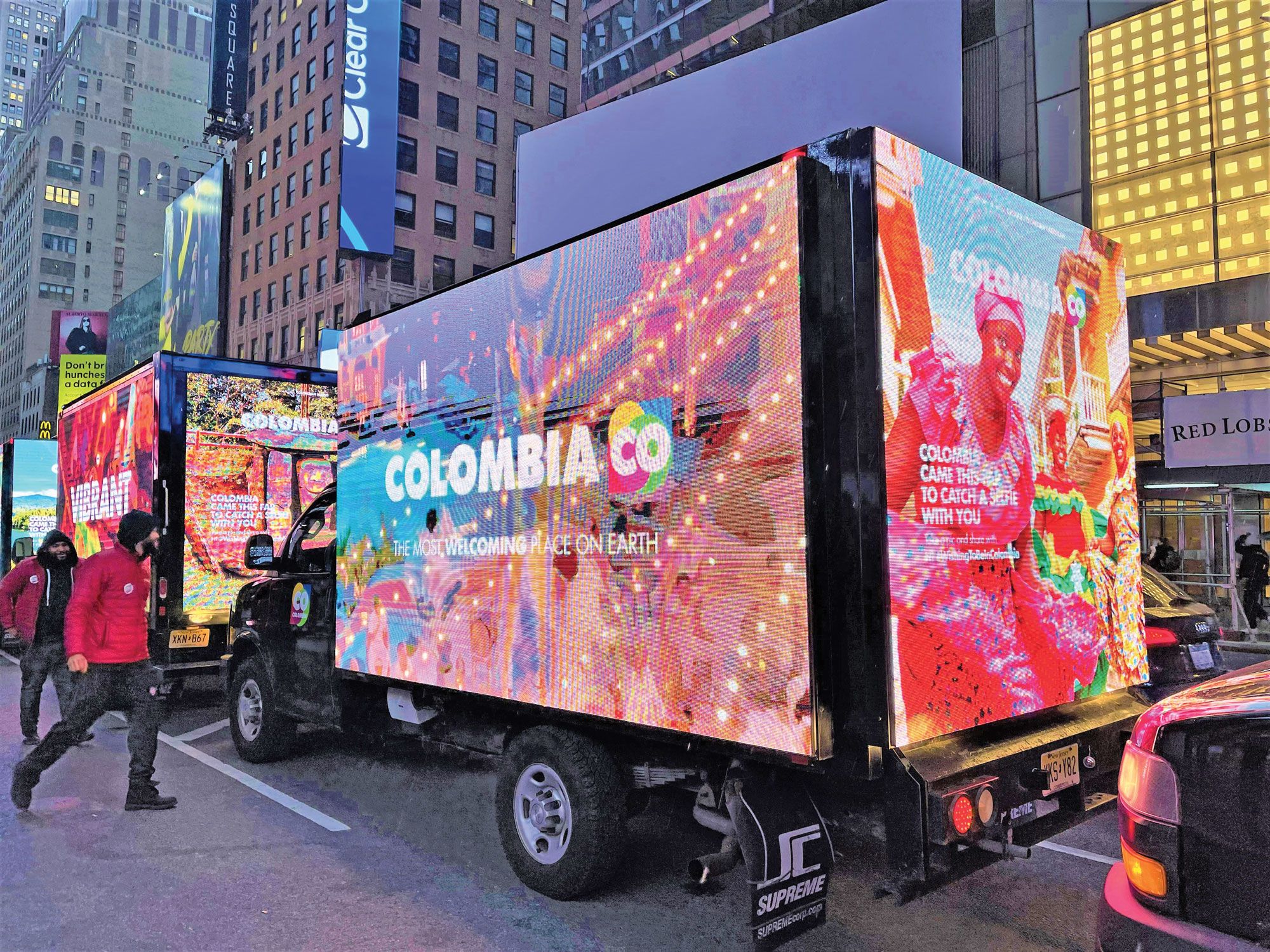 LED-clad trucks caravanned through Manhattan to promote travel to Colombia. (TW photo by Arnie Weissmann)