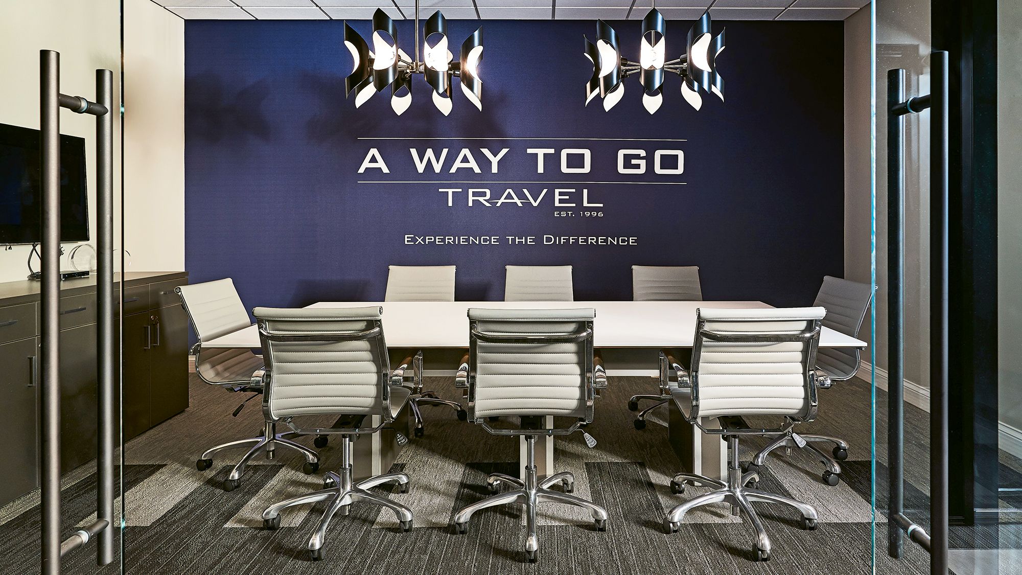 A Way To Go Travel in Greensboro, N.C., recently moved into a new space featuring a modern design and a wall of iPads customers use to check in and explore destinations. Since moving into the space, president Chuck Joyce has seen a distinct uptick in walk-in business of a higher caliber.