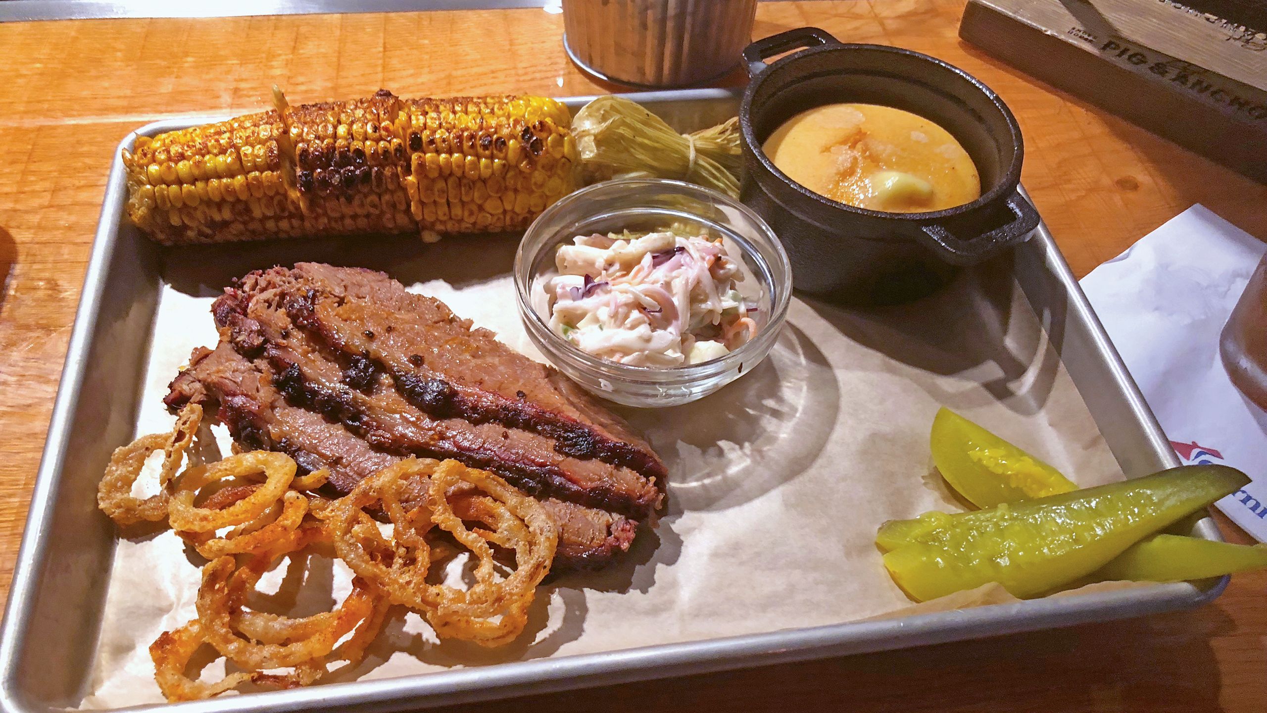 Brisket and sides at the Pig & Anchor on the Carnival Horizon. Photo by Tom Stieghorst